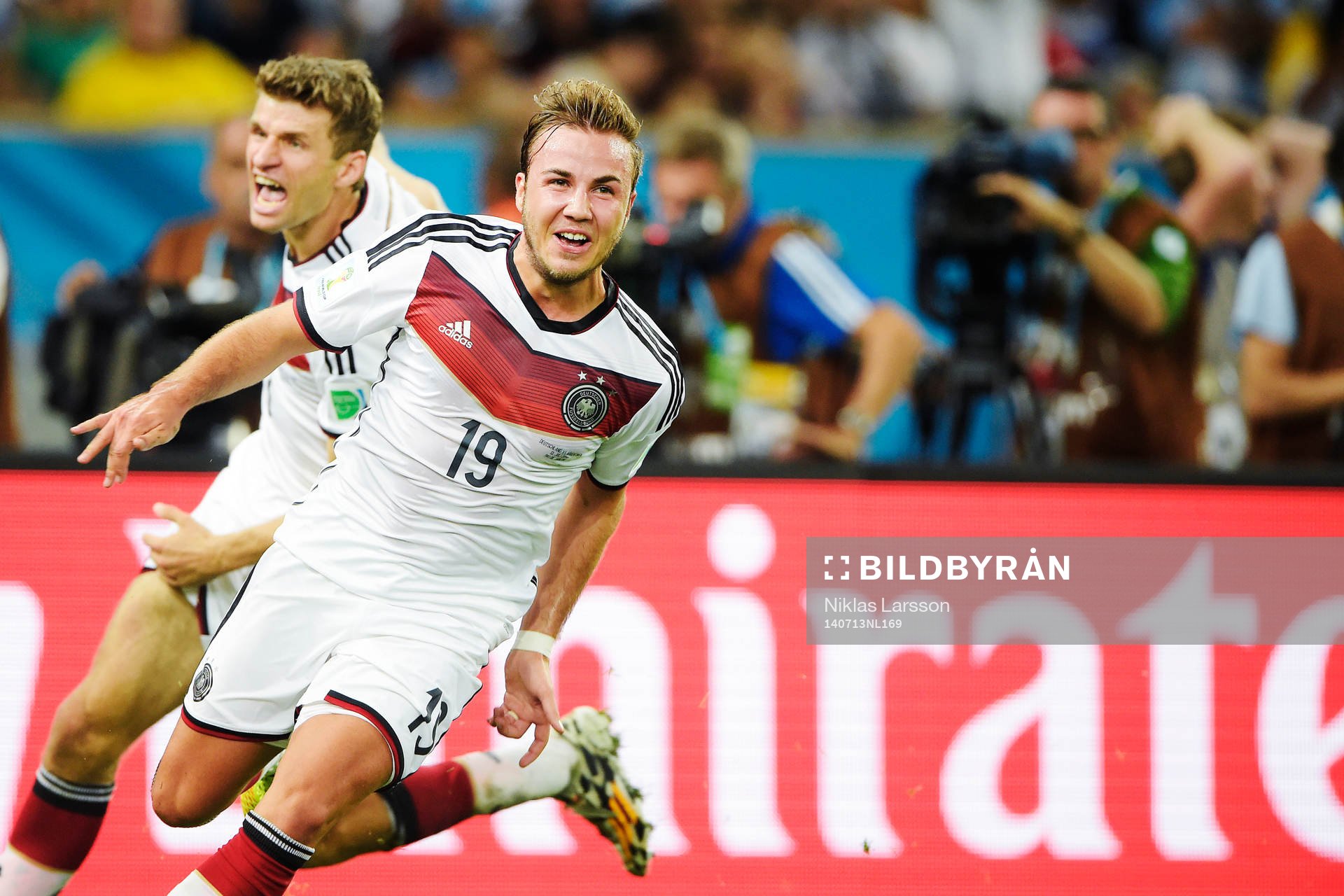 Tysklands Mario Götze och Thomas Müller jublar