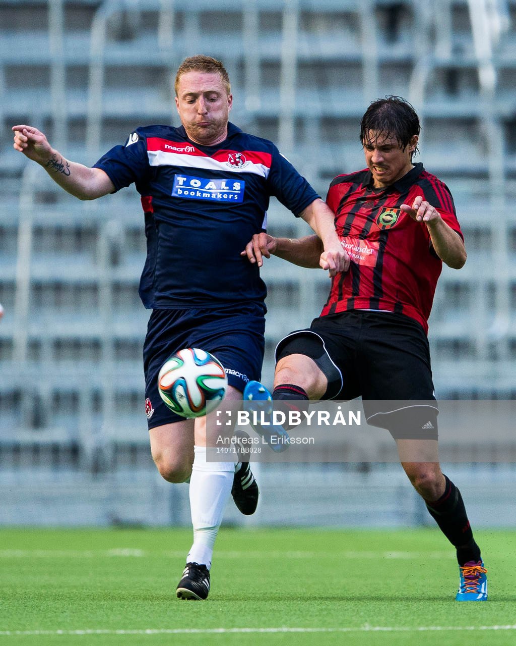 Crusaders Chris Morrow och Brommapojkarnas Gabriel Petrovic i kamp om bollen under fotbollsmatchen i kvalet till Europa League mellan Brommapojkarna - Crusaders den 17 juli 2014 i Stockholm. 