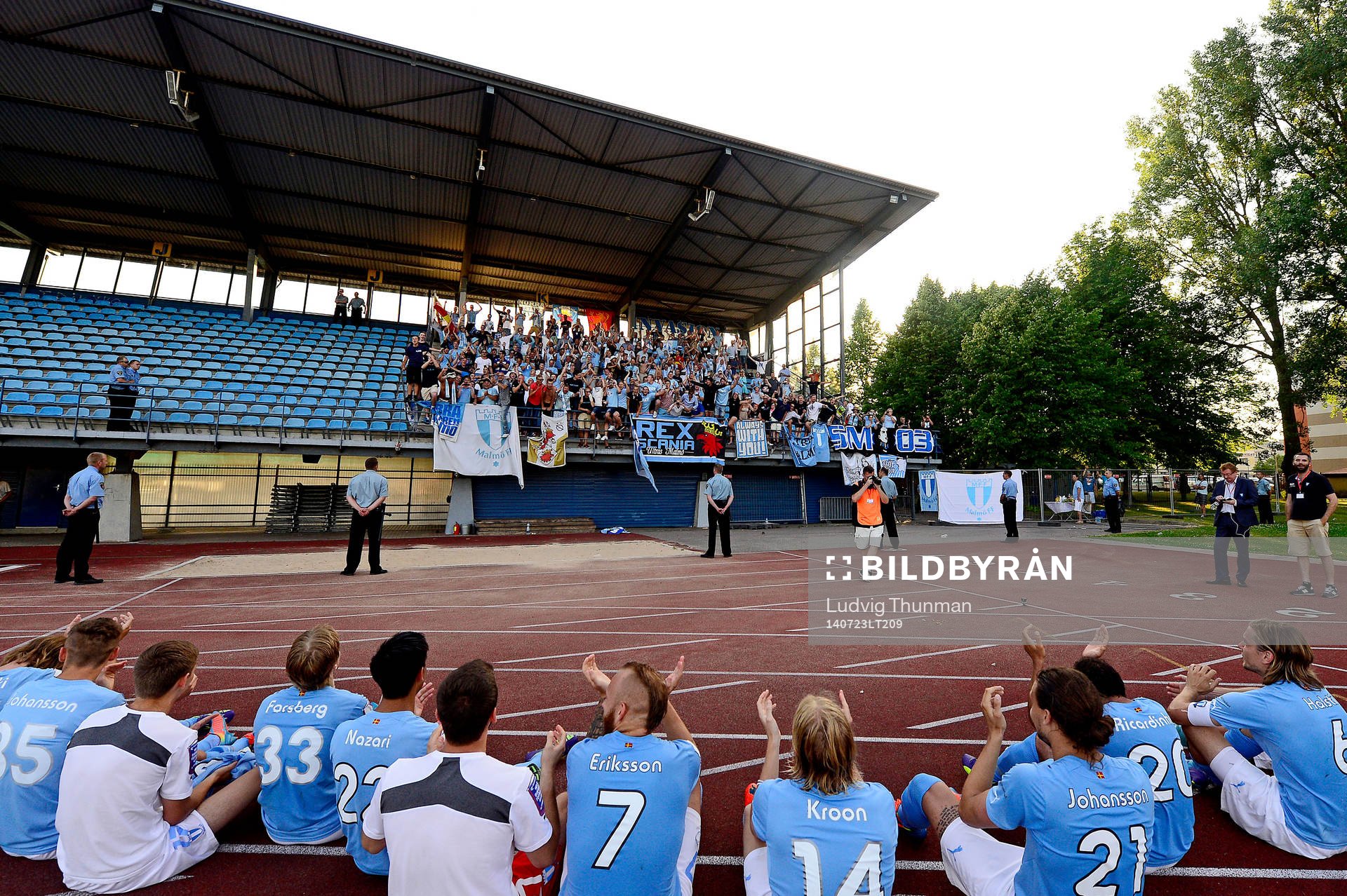 Malmö FFs spelare sätter sig framför klacken som sjunger Malmö vann igen efter kvalmatchen i Champions League mellan FK Ventspils och Malmö FF den 23 juli 2014 i Ventspils.