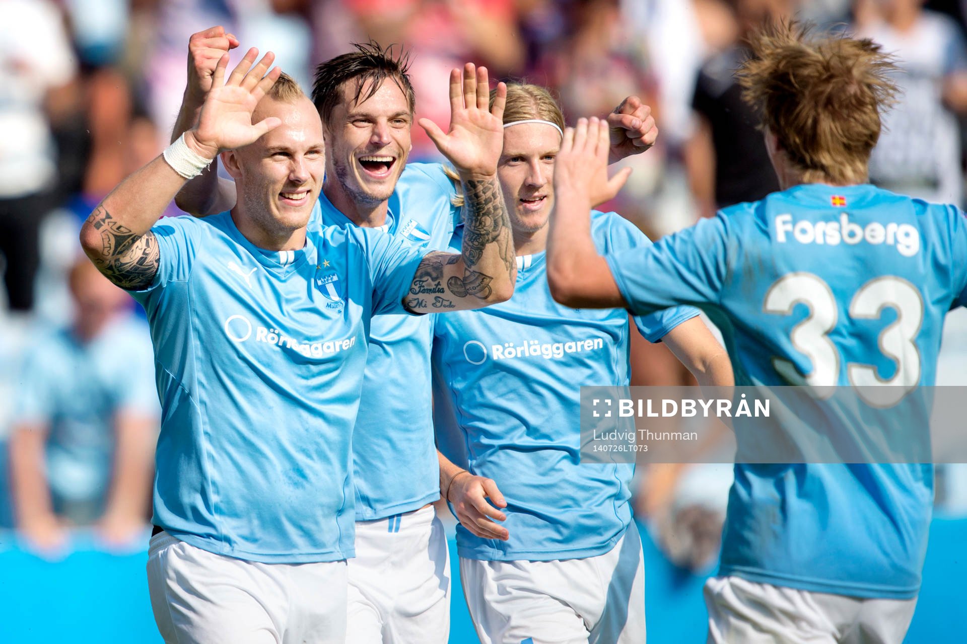 Malmö FFs Markus Rosenberg (mitten) jublar med Magnus Eriksson, Simon Kroon och mötande Emil Forsberg efter han gjort 2-1 under matchen i Allsvenskan mellan Malmö FF och Kalmar den 26 juli 2014 i Malmö.