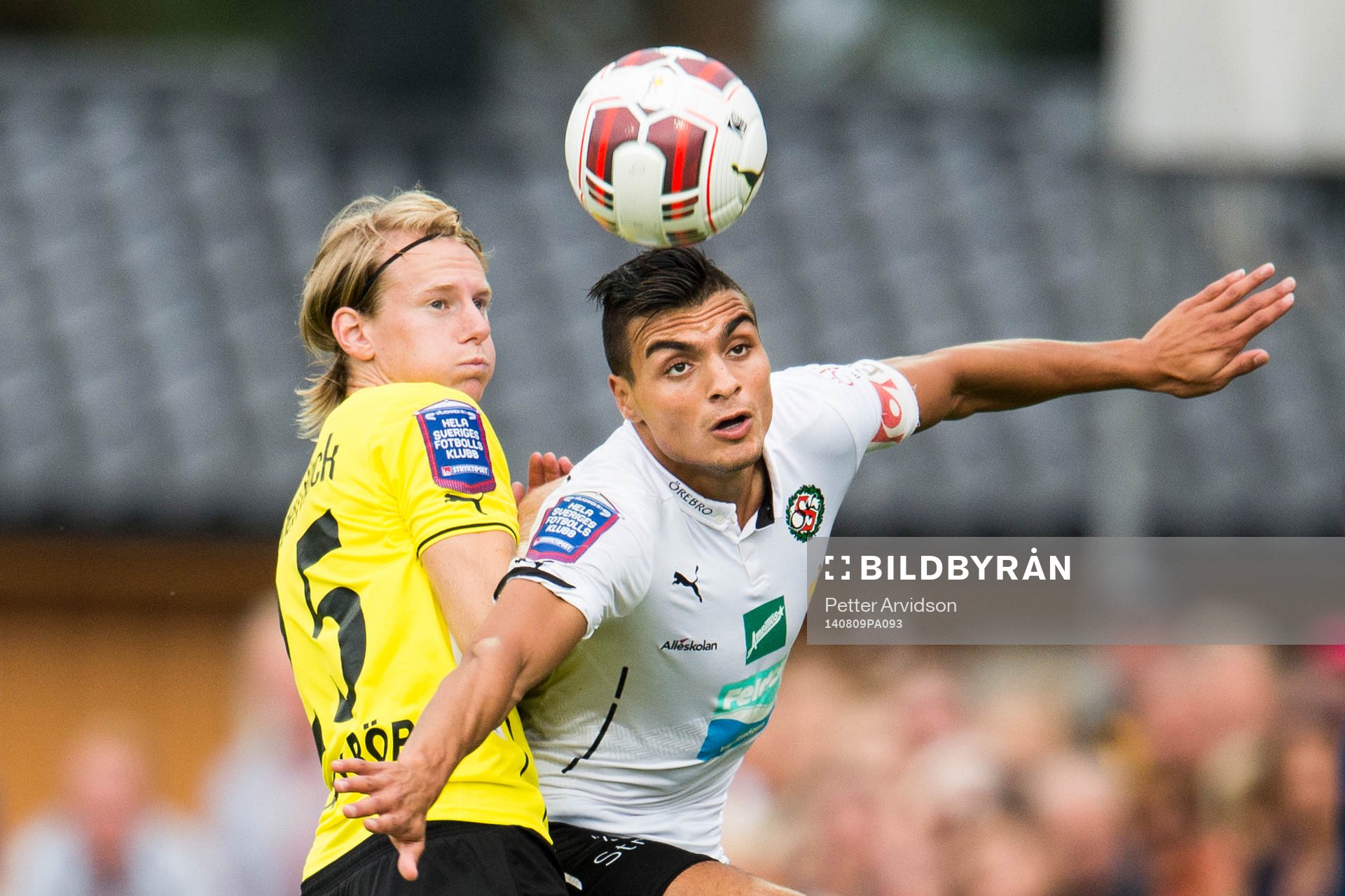 Mjällbys Anton Dahlström i nickduell Örebros Ahmed Yasin under fotbollsmatchen i Allsvenskan mellan Mjällby och Örebro den 9 augusti 2014 i Mjällby.