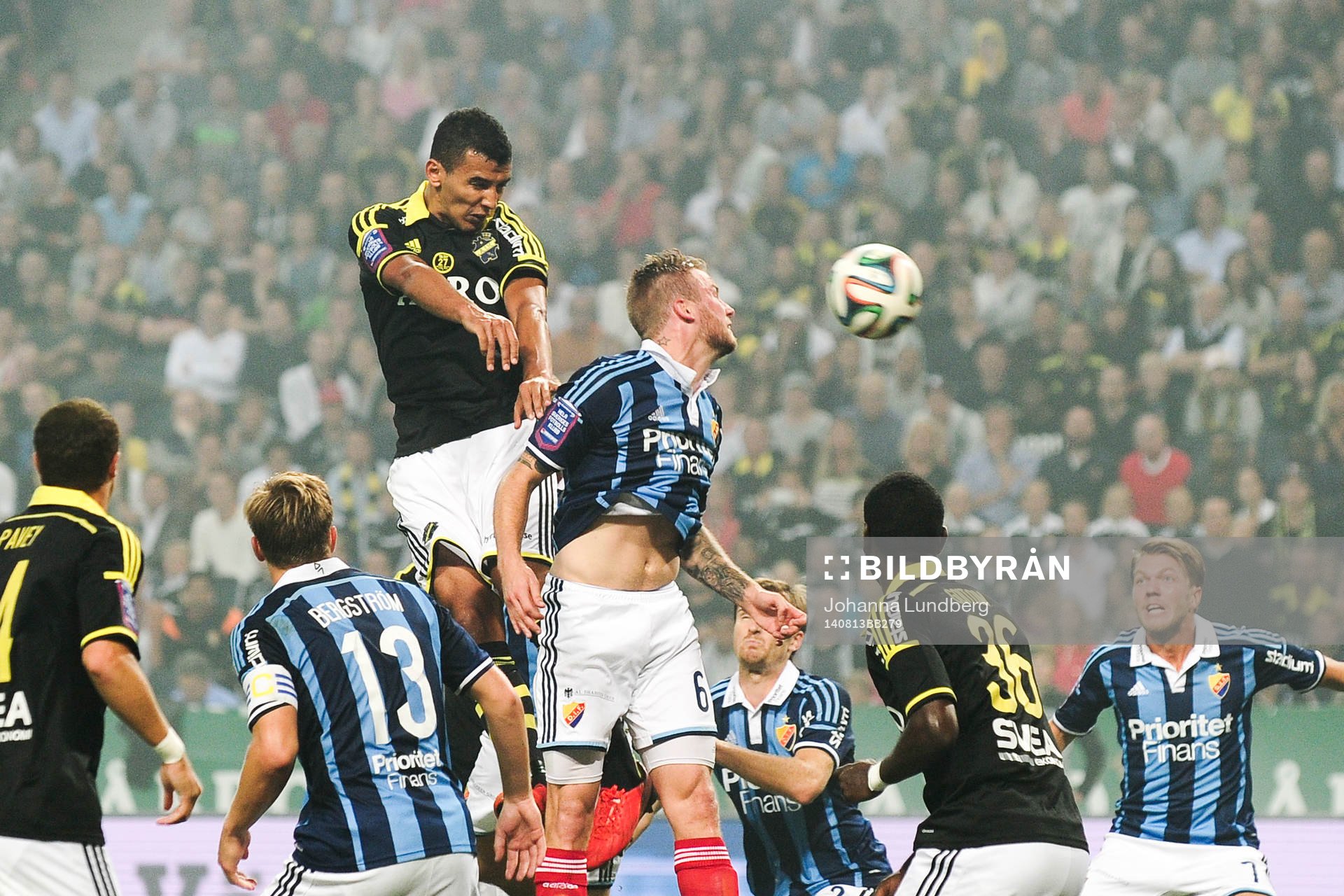 AIK:s Nabil Bahoui och Djurgårdens Aleksander Faltsetas under fotbollsmatchen i Allsvenskan mellan AIK och Djurgården den 13 augusti 2014 i Stockholm.