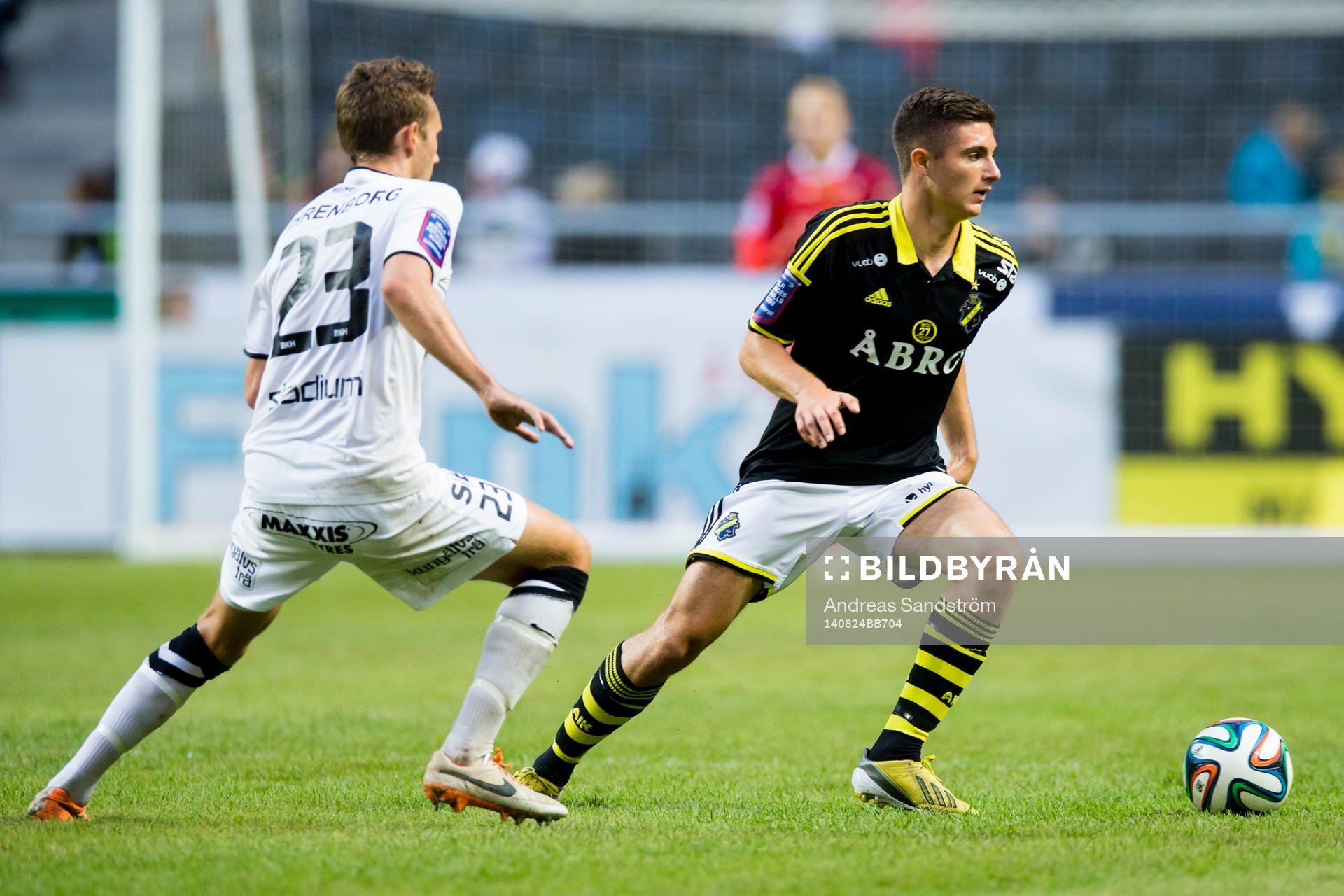 AIK:s Marko Nikolic och Häckens Simon Sandberg under fotbollsmatchen i Allsvenskan mellan AIK och BK Häcken den 24 Augusti 2014 i Stockholm. 