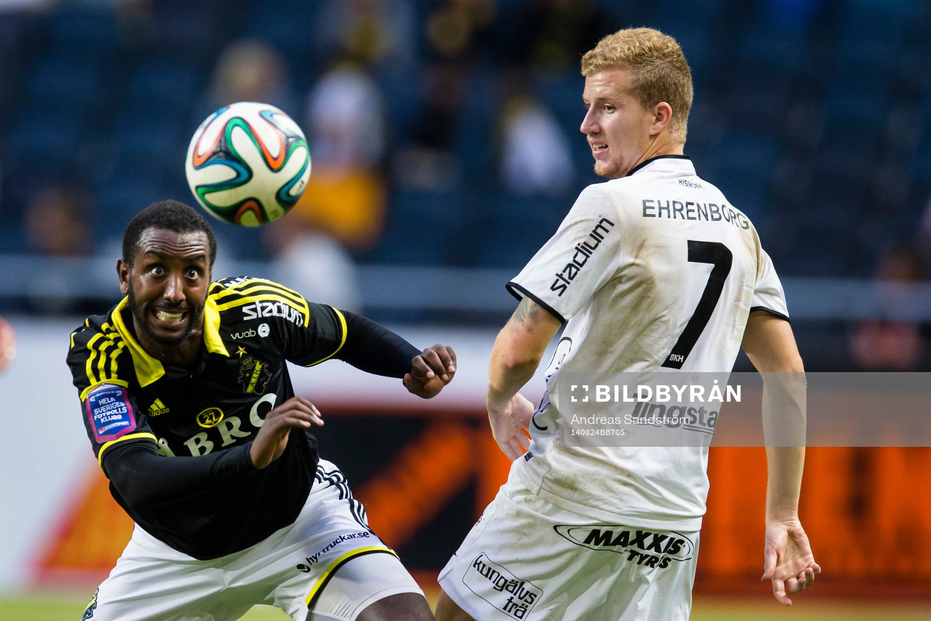 AIK:s Henok Goitom och Häckens Simon Gustafson under fotbollsmatchen i Allsvenskan mellan AIK och BK Häcken den 24 Augusti 2014 i Stockholm. 
