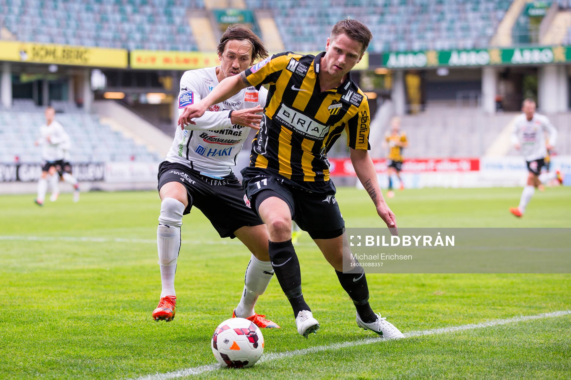 Mjällbys Daniel Ivanovski i kamp med Häckens Gunnar Heidar Thorvaldsson under fotbollsmatchen i Allsvenskan mellan Häcken - Mjällby den 30 Augusti 2014 i Göteborg.