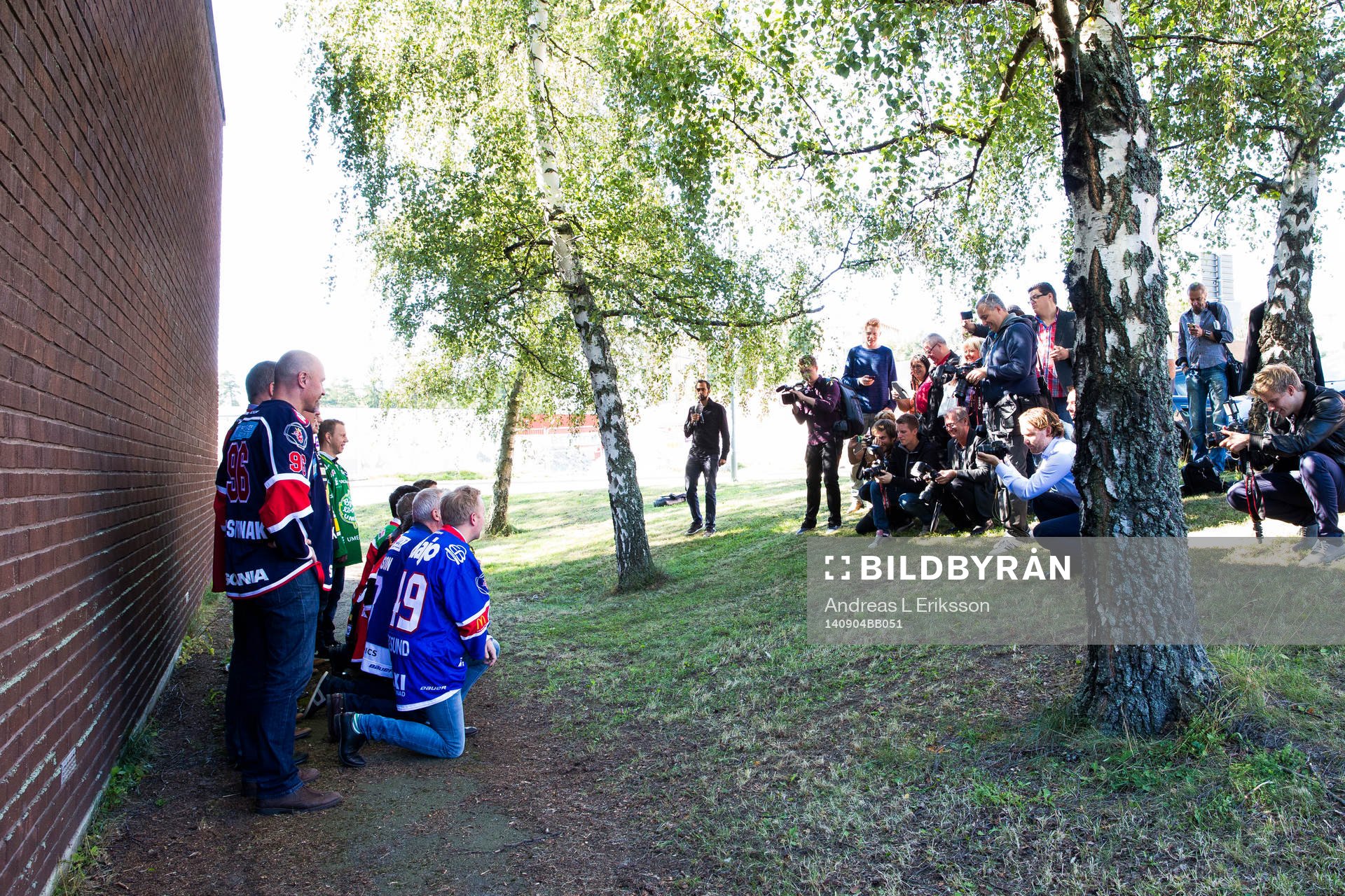 Pressen tar en gruppbild på tränarna