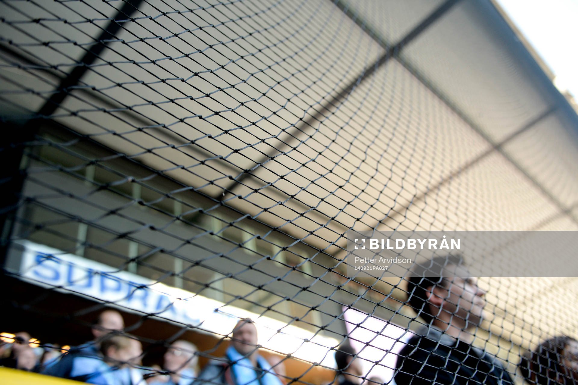 Ett nät är uppsatt framför Malmö-klacken för att förhindra att föremål kastas in under matchen i Allsvenskan mellan Malmö FF och Helsingborg den 21 september 2014 i Malmö.