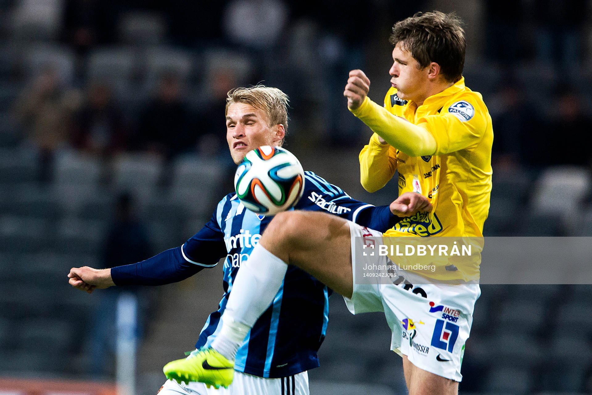 Djurgårdens Sebastian Andersson och Falkenbergs Daniel Johansson under fotbollsmatchen i Allsvenskan mellan Djurgården och Falkenberg den 24 September 2014 i Stockholm.