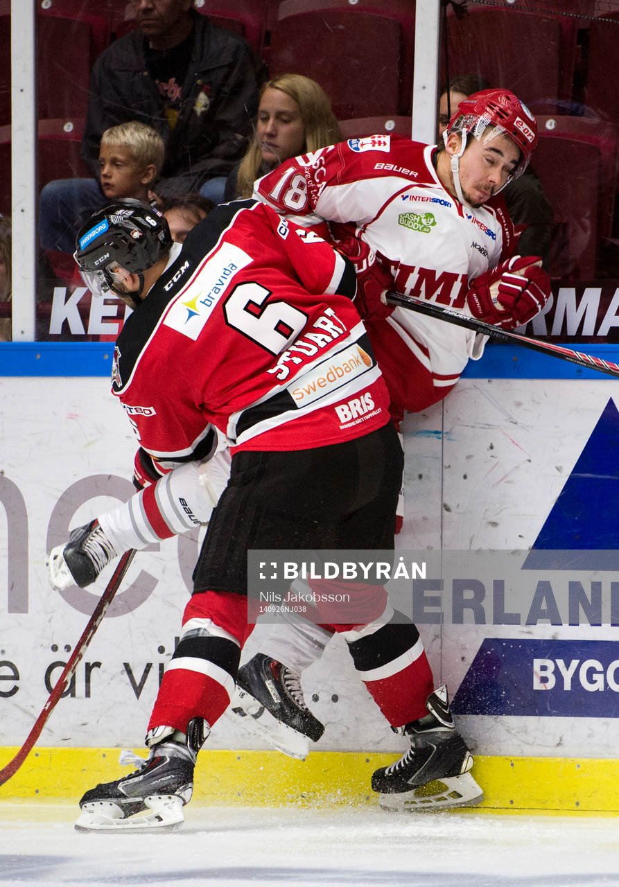 Malmö Redhawks Colin Stuart tacklar Timrås Jens Westin