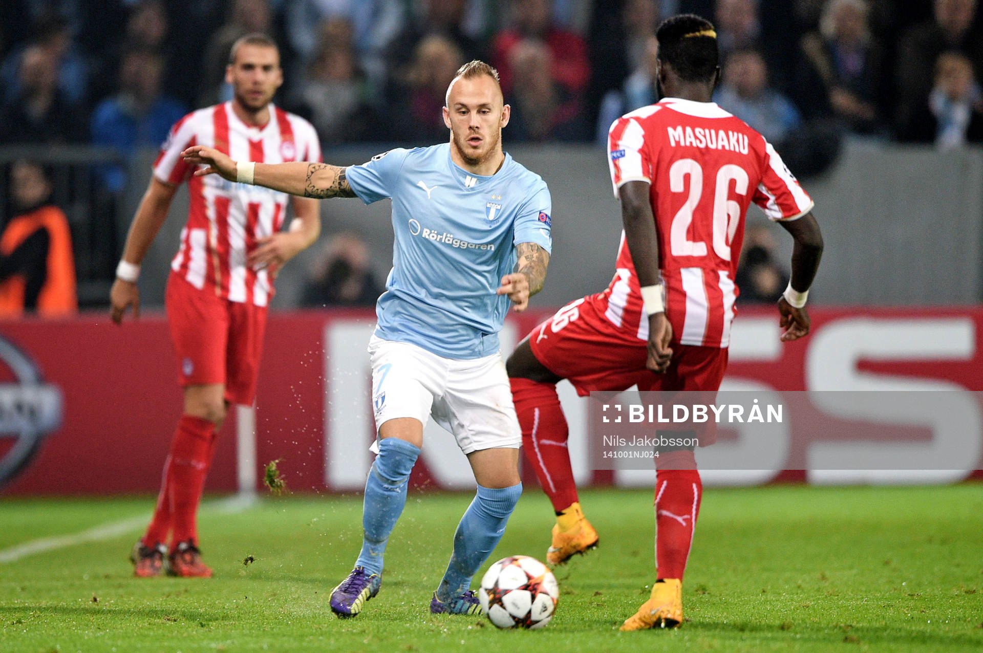 Malmö FFs Magnus Eriksson och Olympiacos Arthur Masuaku