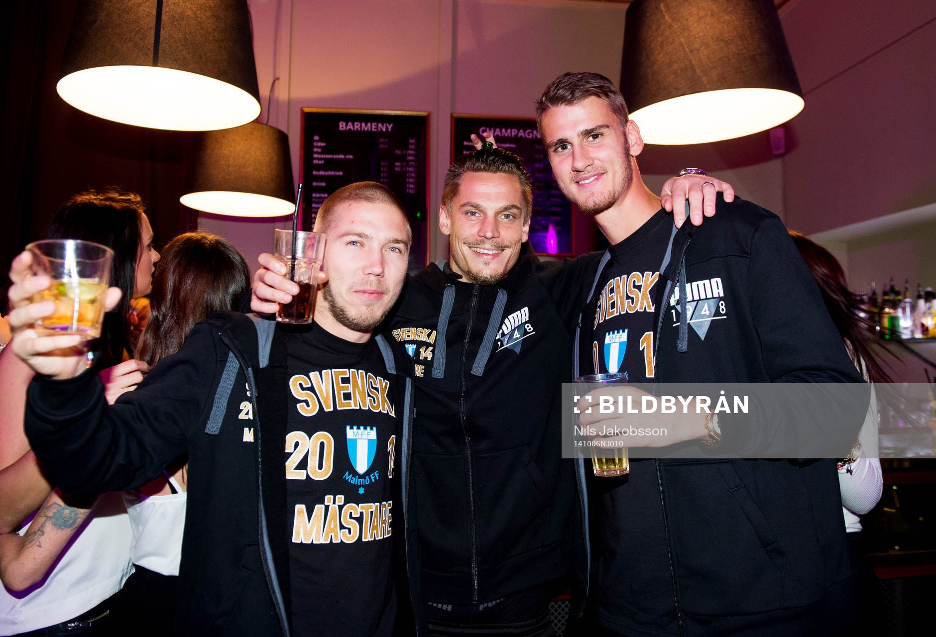 Anton Tinnerholm, Markus Rosenberg, Johan Hammar när Malmö FF firar sitt SM-guld den 5 oktober 2014 i Malmö.