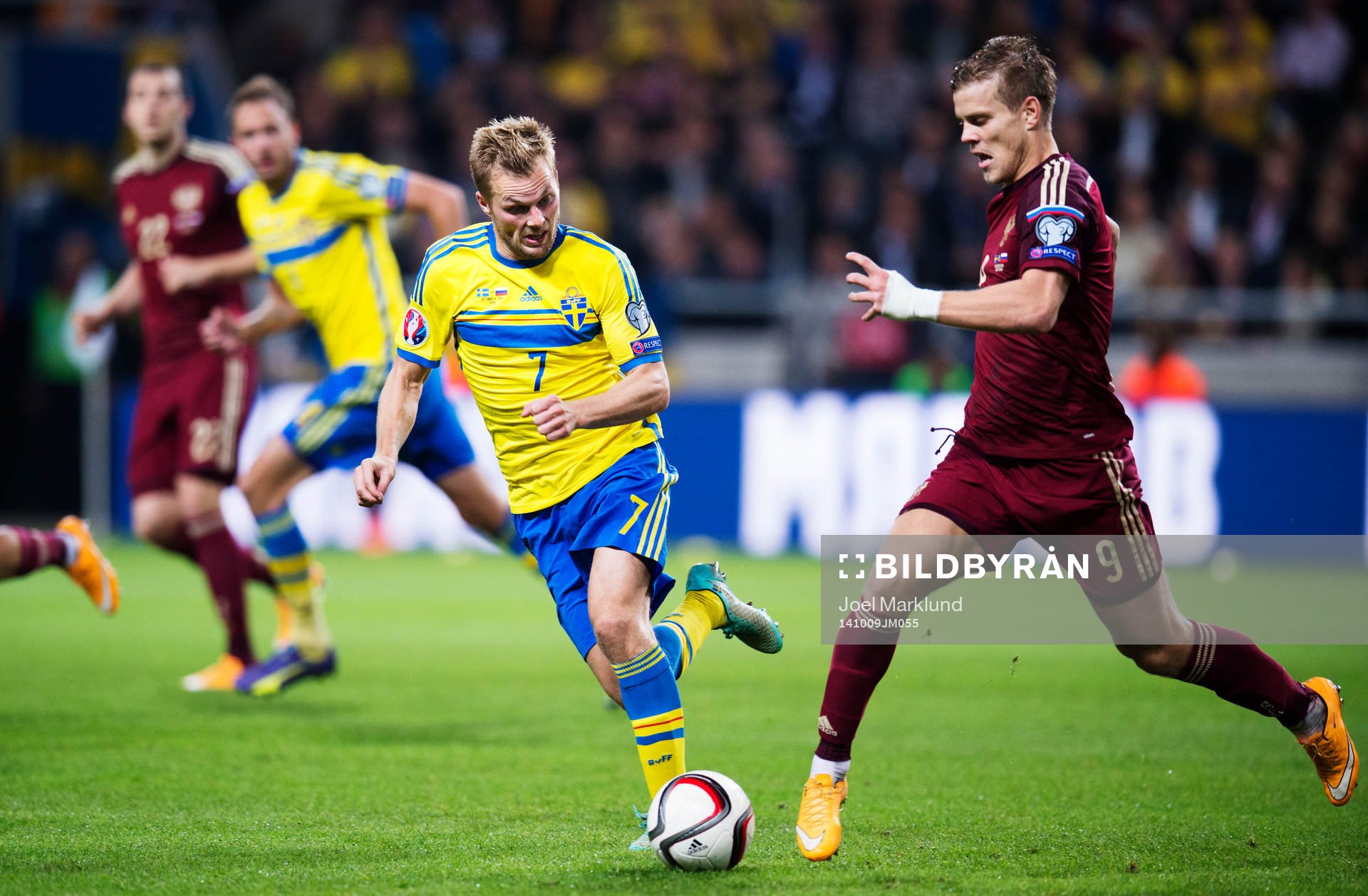 Sveriges Sebastian Larsson och Rysslands Aleksandr Kokorin