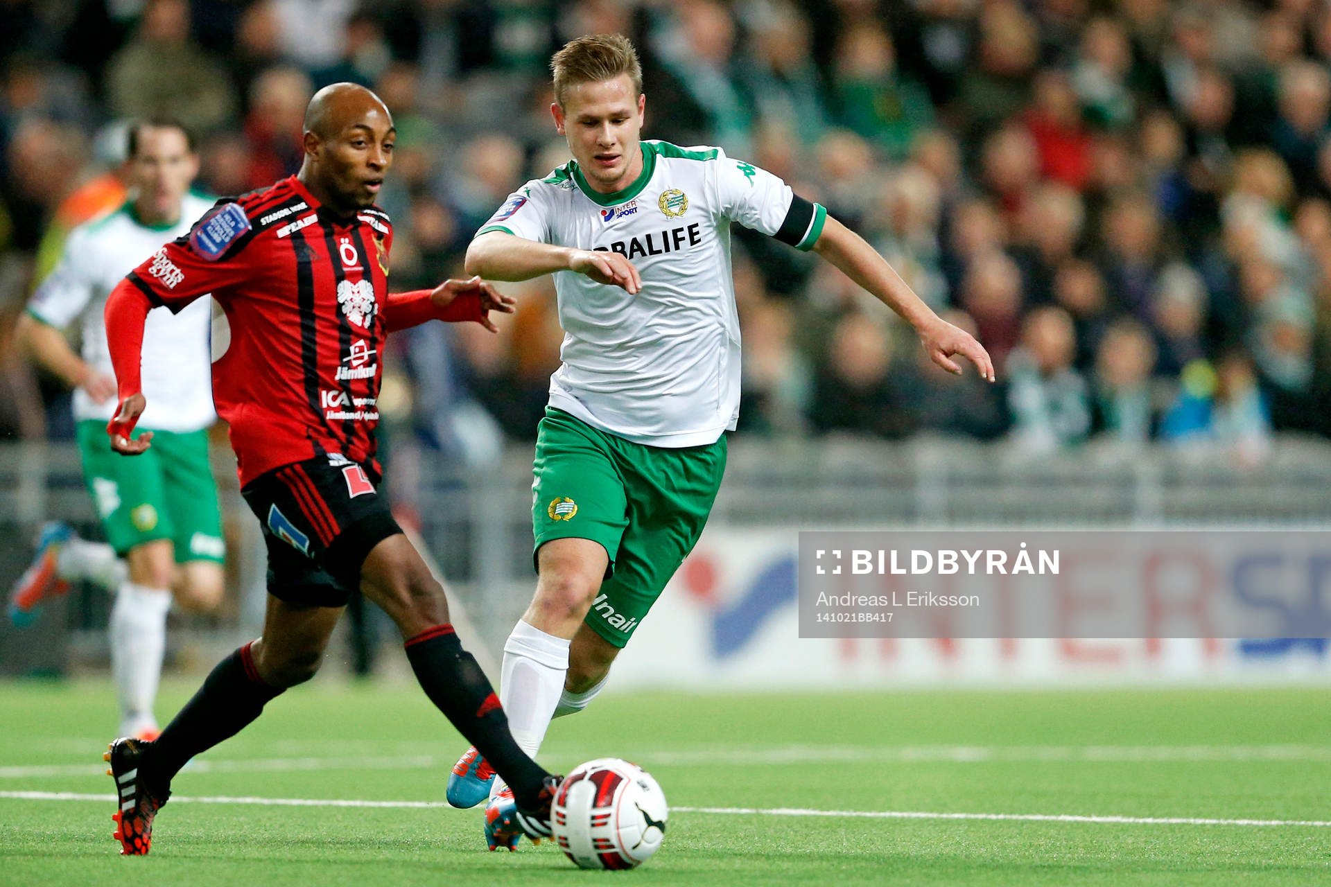 Östersunds Fouad Bachirou och Hammarbys Erik Israelsson under fotbollsmatchen i Superettan mellan Hammarby och Östersund den 21 oktober 2014 i Stockholm.