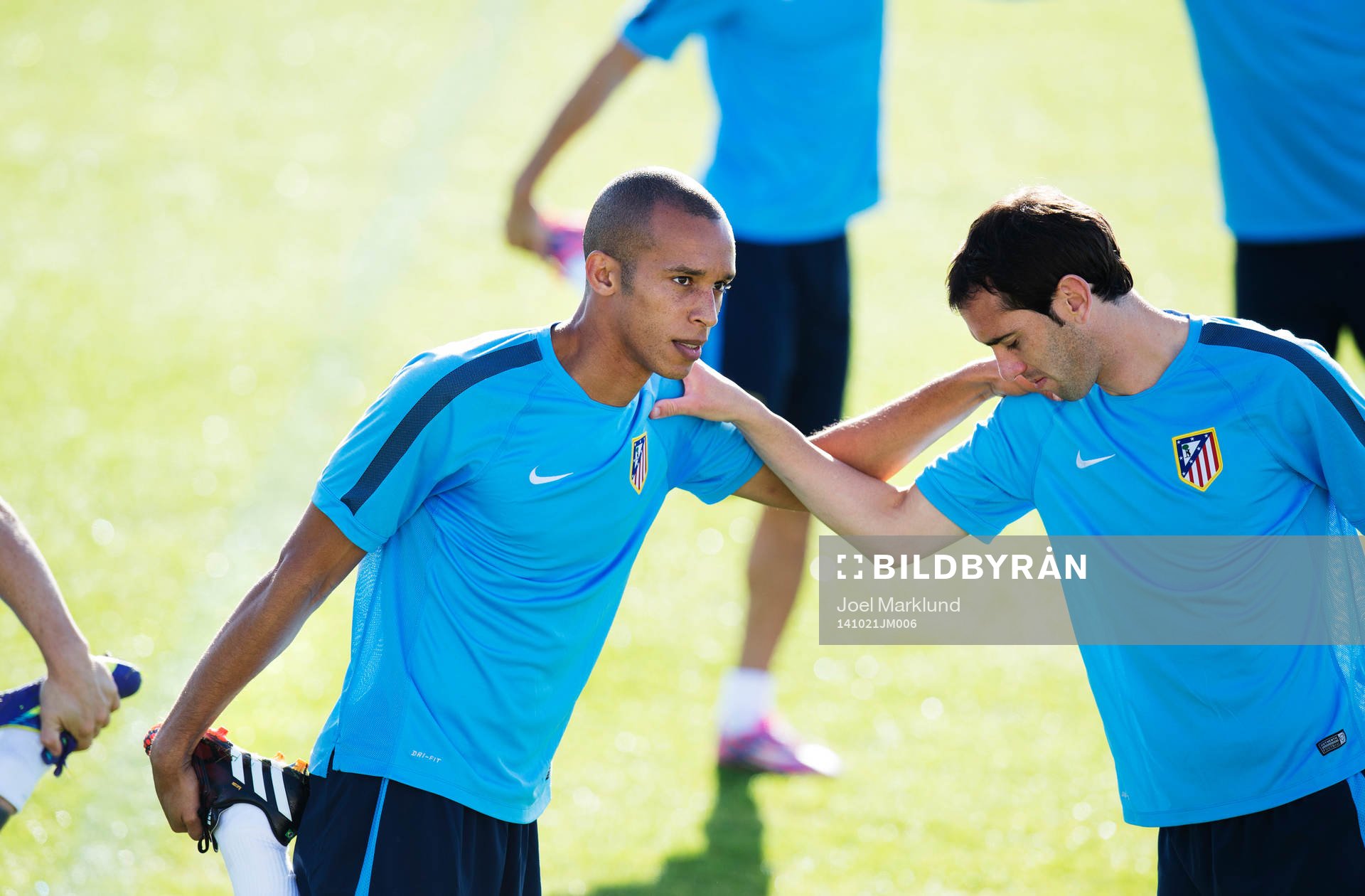 Miranda och Diego Godin under Atletico Madrids träning den 21 oktober 2014 i Madrid.