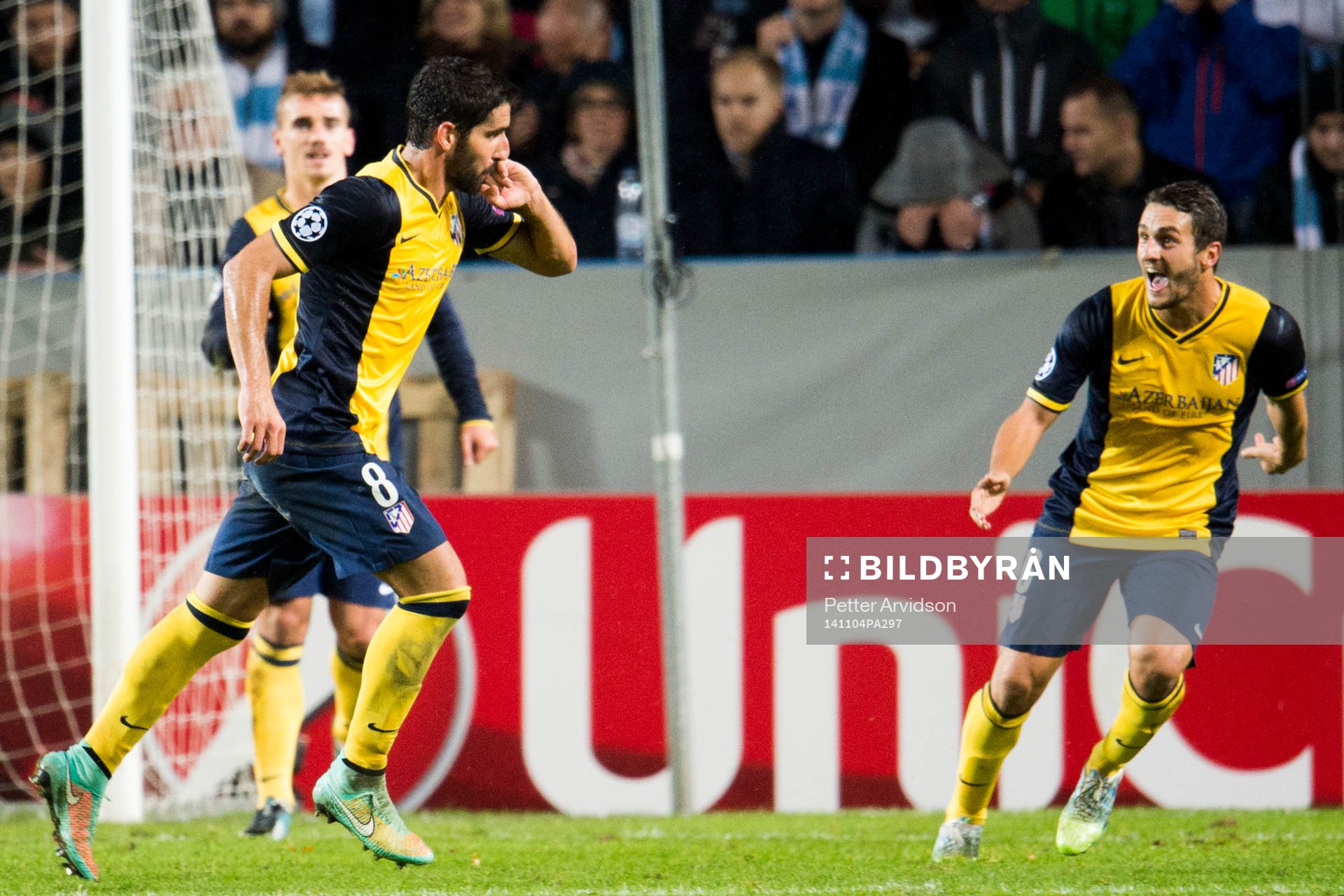 Atletico Madrids Raul Garcia (tv) jublar ihop med Koke (th)