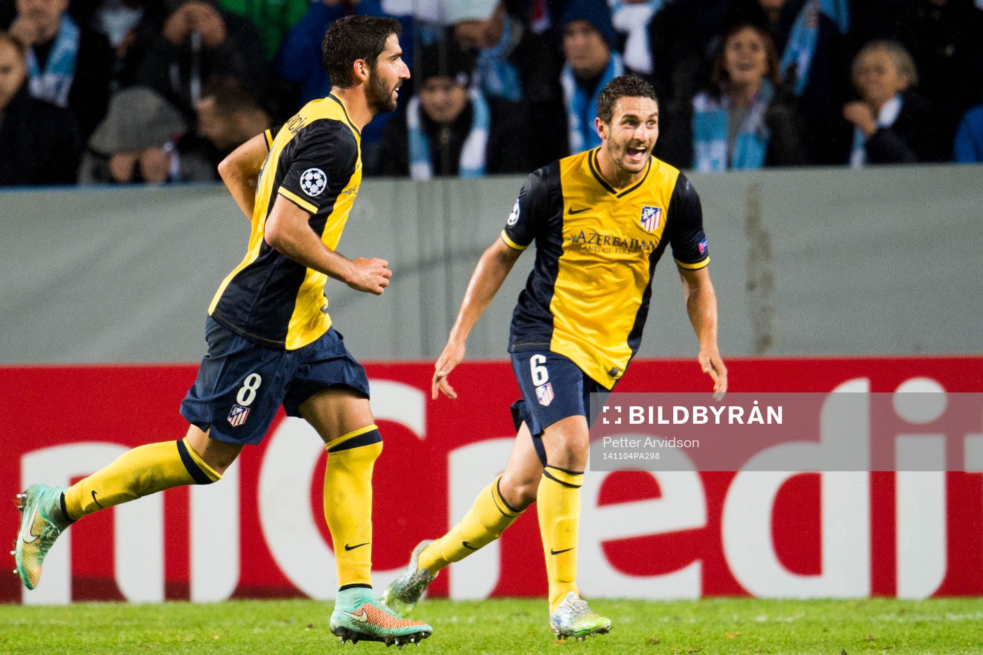 Atletico Madrids Raul Garcia (tv) jublar ihop med Koke (th)