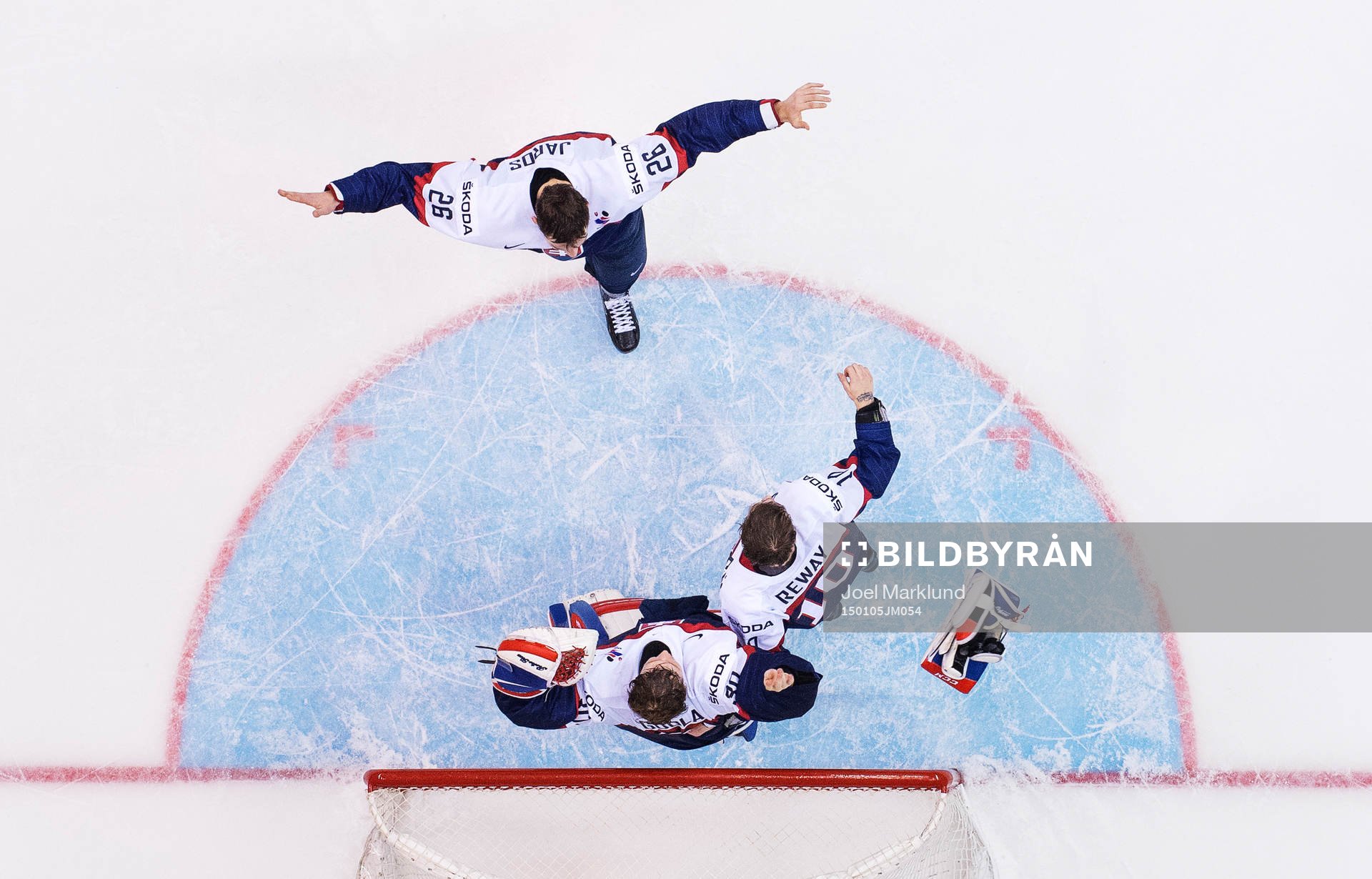 Slovakiens Christian Jaros, målvakt Denis Godla och Martin