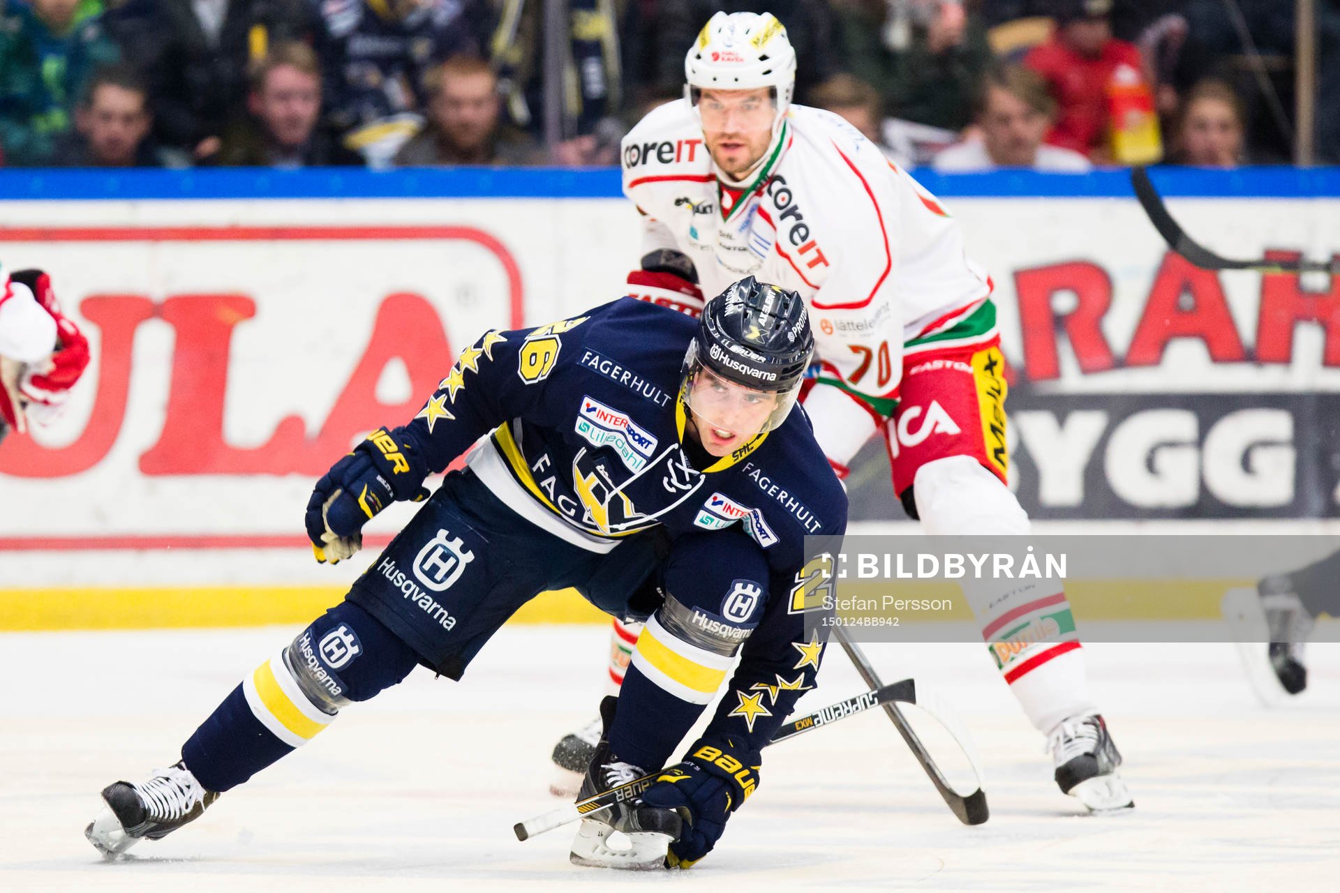 s Riley Holzapfel mot Modos Radek Smolenak