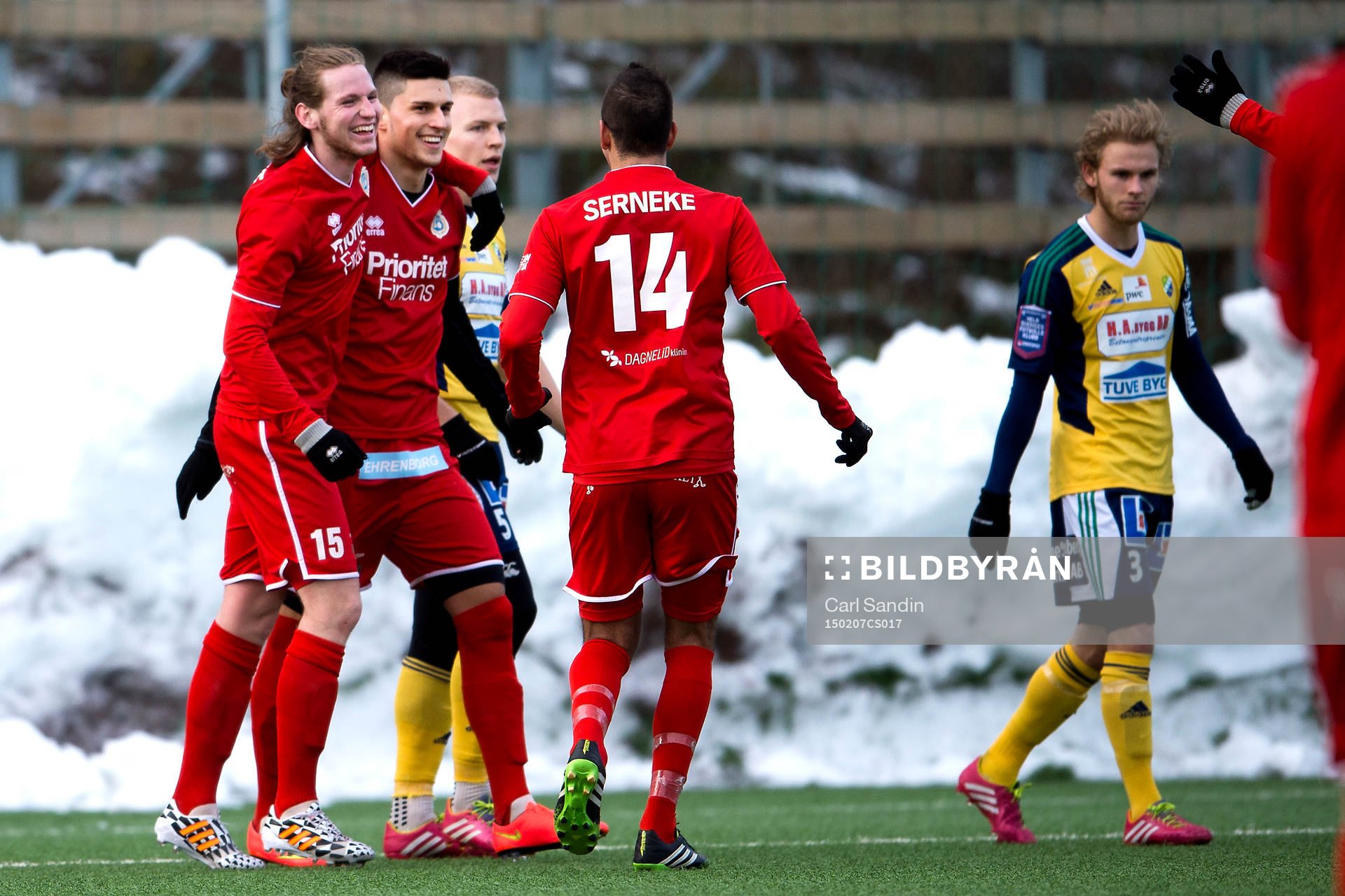 Utsiktens Daniel Tidstrand, Luka Mijaljevic och Enis Maljici jublar efter 4-0 under en träningsmatch i fotboll mellan Utsikten och Ljungskile den 7 februari 2015 i Göteborg.