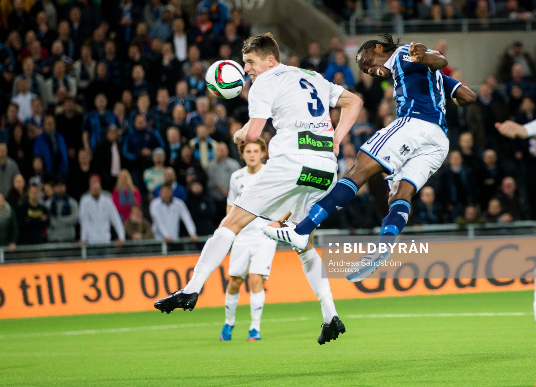 Djurgårdens Sam Johnson ligger i luften bredvid Ängelholms Fredrik Lundgren efter en nick på mål under fotbollsmatchen i Svenska Cupen mellan Djurgården och Ängelholm den 22 Februari 2015 i Stockholm.