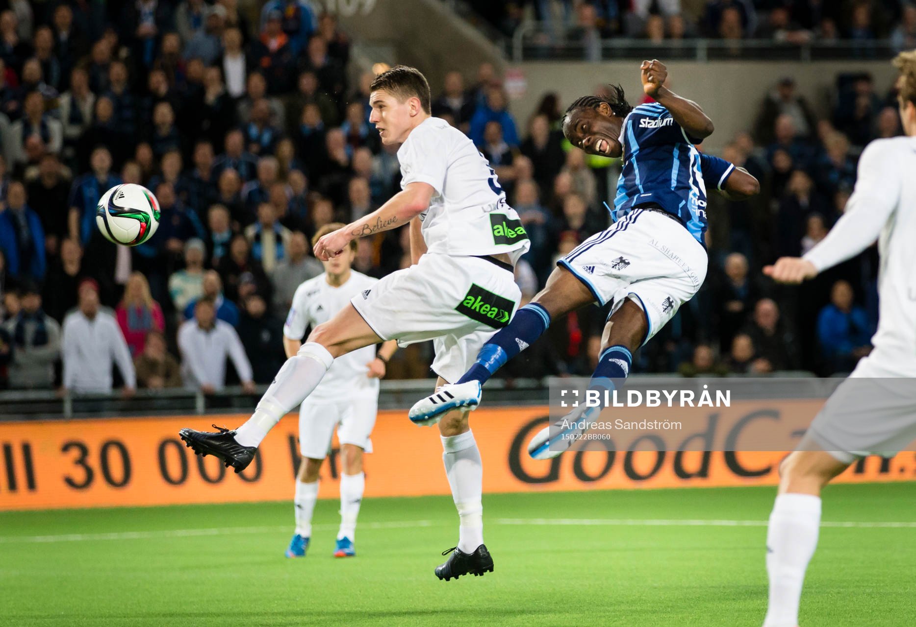 Djurgårdens Sam Johnson ligger i luften bredvid Ängelholms Fredrik Lundgren efter en nick på mål under fotbollsmatchen i Svenska Cupen mellan Djurgården och Ängelholm den 22 Februari 2015 i Stockholm.