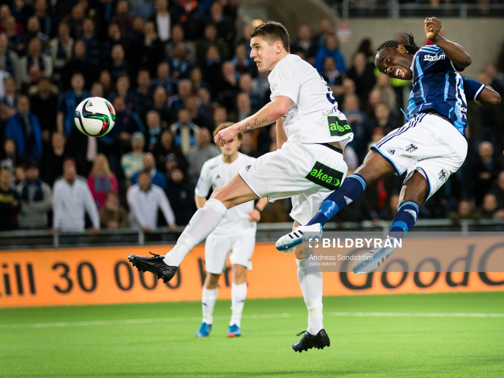 Djurgårdens Sam Johnson ligger i luften bredvid Ängelholms Fredrik Lundgren efter en nick på mål under fotbollsmatchen i Svenska Cupen mellan Djurgården och Ängelholm den 22 Februari 2015 i Stockholm.