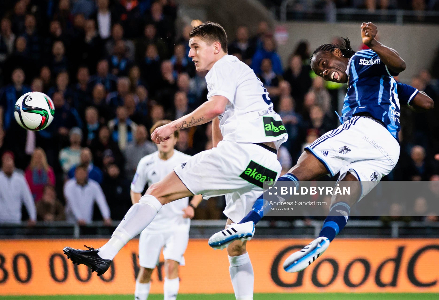 Djurgårdens Sam Johnson ligger i luften bredvid Ängelholms Fredrik Lundgren efter en nick på mål under fotbollsmatchen i Svenska Cupen mellan Djurgården och Ängelholm den 22 Februari 2015 i Stockholm.