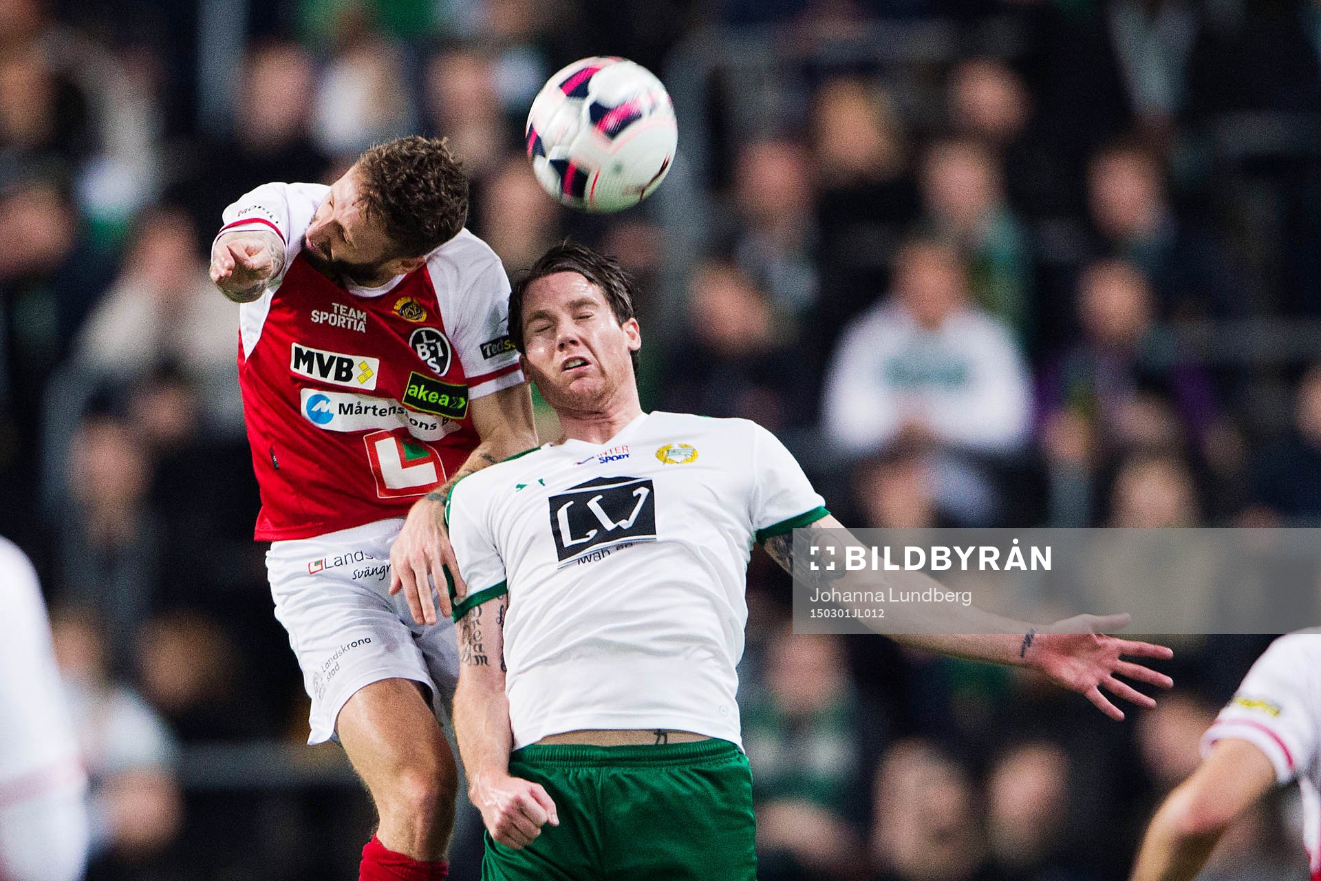 Landskronas Andrew Stadler och Hammarbys Johan Persson i en nickduell under fotbollsmatchen i Svenska Cupen mellan Hammarby och Landskrona den 1 mars 2015 i Stockholm.