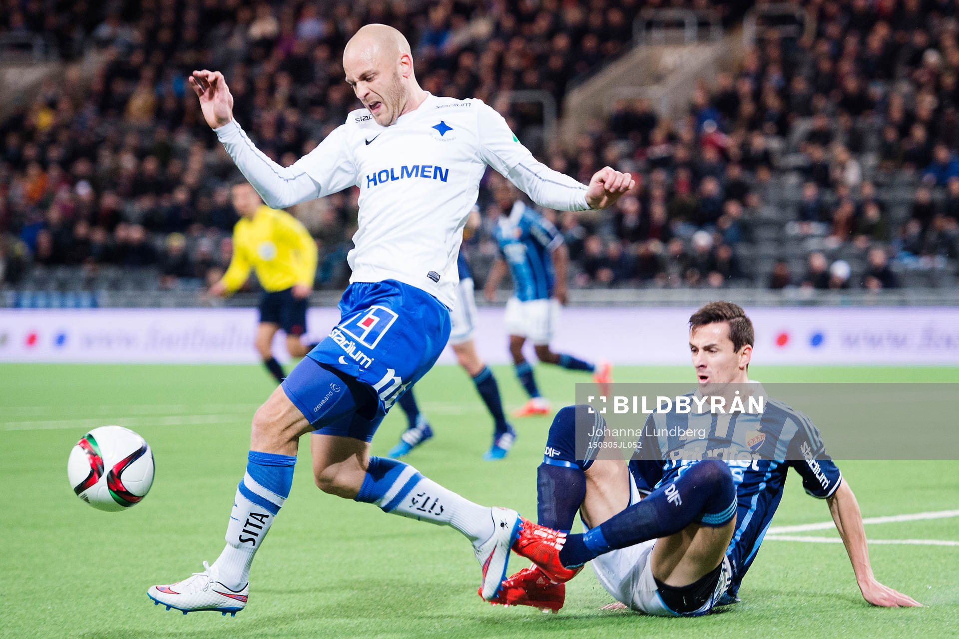 Norrköpings Daniel Sjölund och Djurgårdens Haris Radetinac under fotbollsmatchen i Svenska cupen mellan Djurgården och Norrköping den 5 mars 2015 i Stockholm.