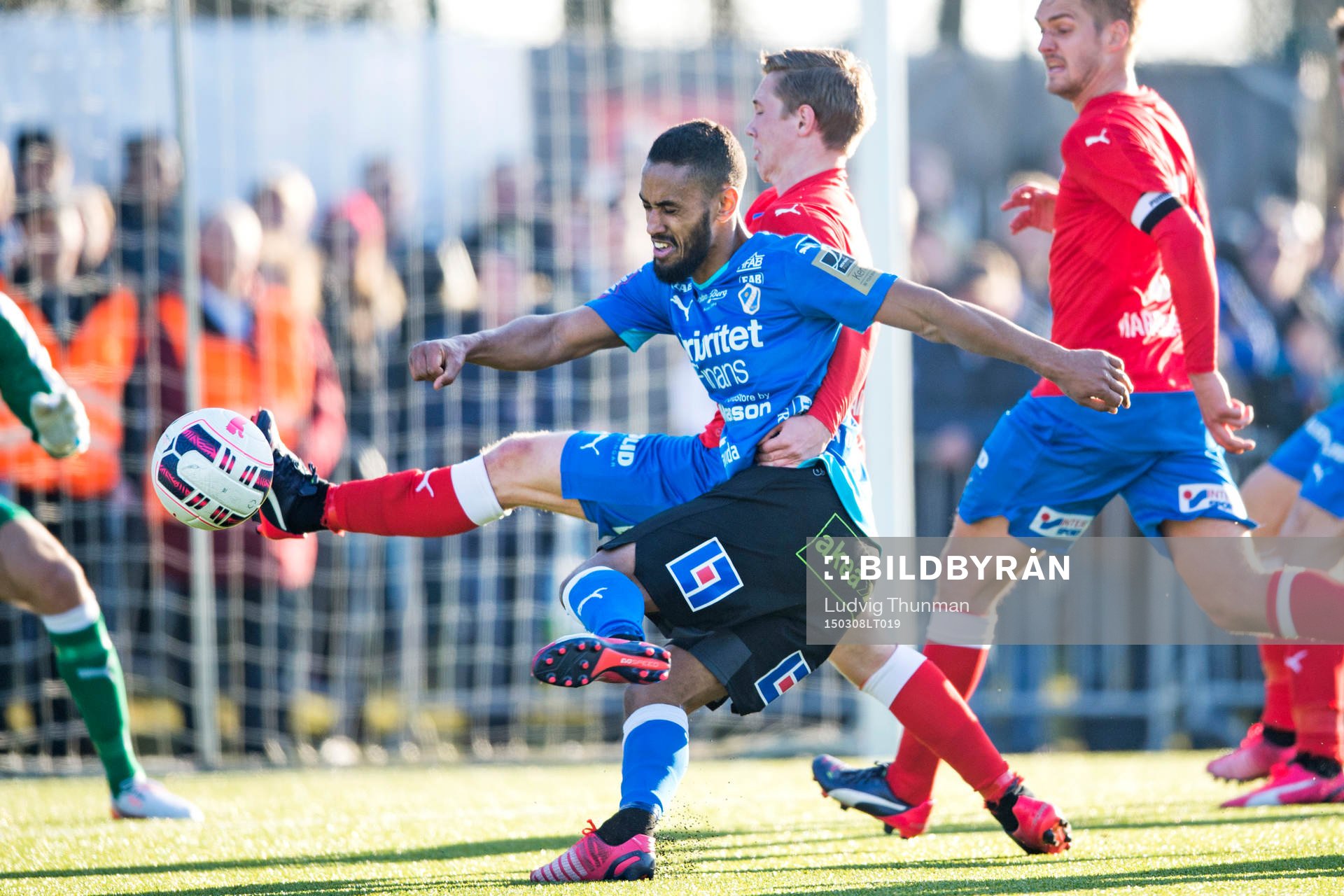 Halmstads Junes Barny i kamp med Helsingborgs Gustav Jarl under fotbollsmatchen i Svenska Cupen mellan Helsingborg och Halmstad den 8 mars 2015 i Helsingborg.