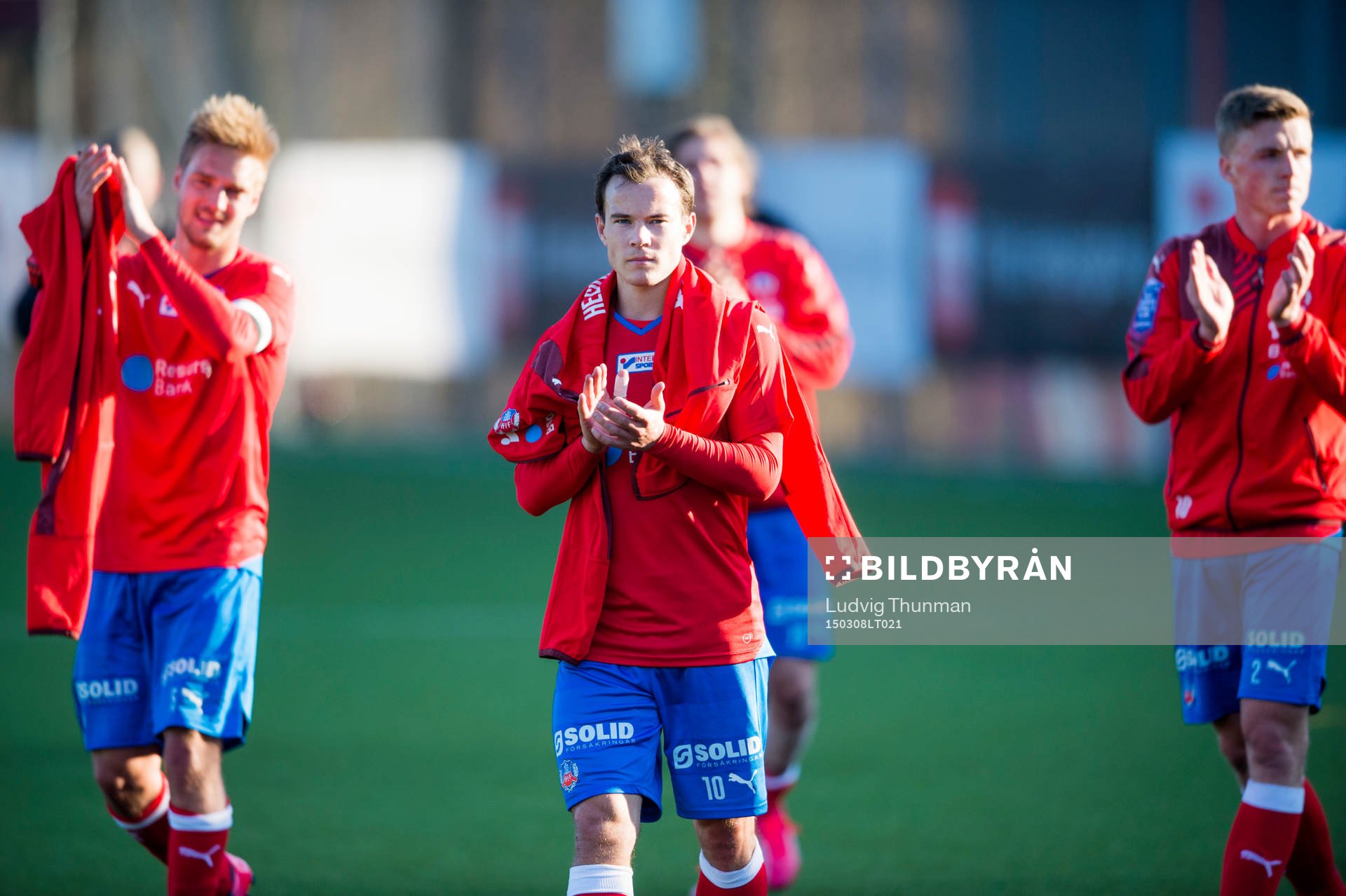 Helsingborgs Johan Mårtensson, Anton Wede och Carl Johansson tackar publiken efter fotbollsmatchen i Svenska Cupen mellan Helsingborg och Halmstad den 8 mars 2015 i Helsingborg.
