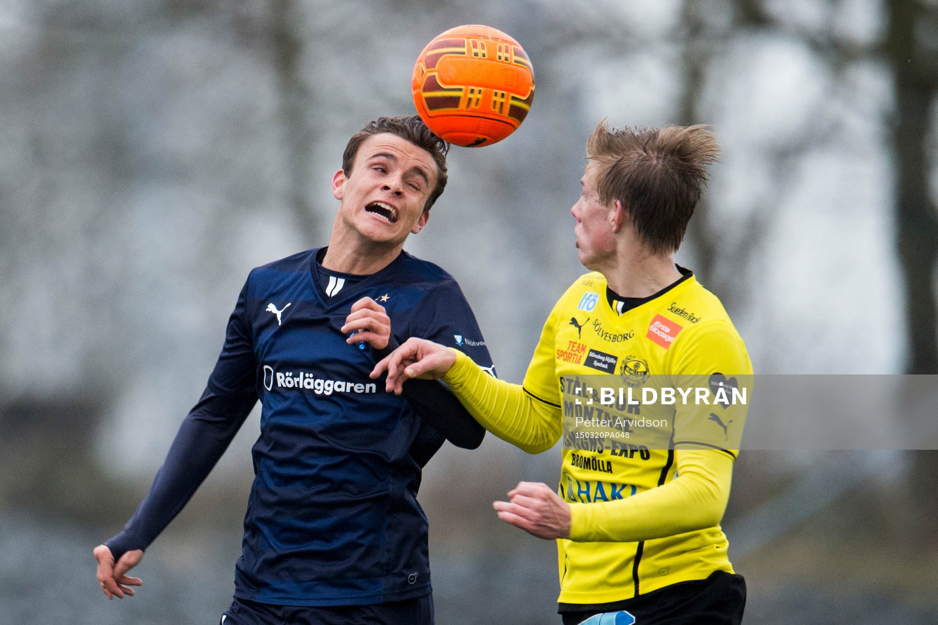 Malmö FFs Andreas Vindheim och Mjällbys Eric Björkander under en träningsmatch i fotboll mellan Mjällby och Malmö FF den 20 mars 2015 i Mjällby.