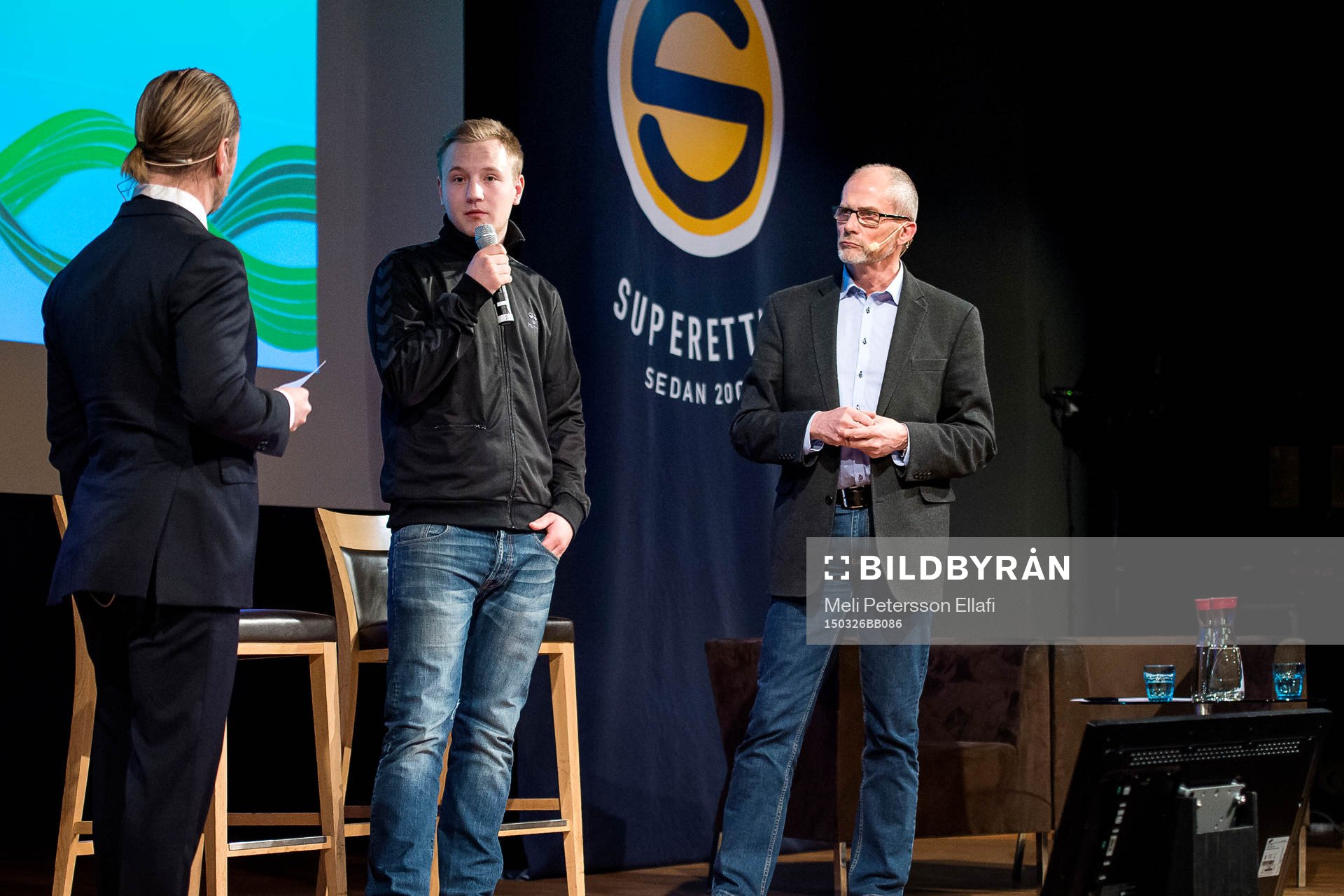 Jesper Hussfelt konferencier, John Pernsved från SFSU och Lars-Christer Olsson från Svensk Elitfotboll under upptaktsträffen inför Superettan i fotboll den 26 mars 2015 i Stockholm.