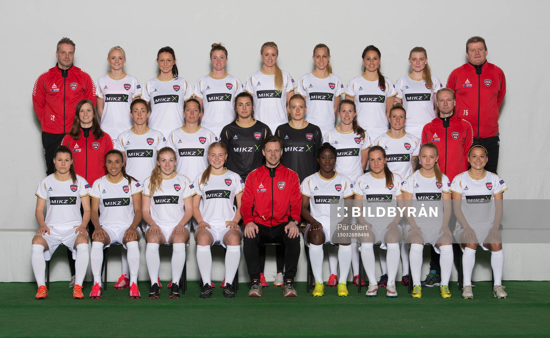 Lagbild för FC Rosengård i Damallsvenskan den 25 mars 2015 i Malmö. Övre raden från vänster: Tomas Håkansson (Mv.Tränare), Emma Pennsäter, Malin Gunnarsson, Kirsten van de Ven, Amanda Ilestedt, Line Röddik Hansen, Sara Björk Gunnarsdottir, Sofia Hagman, Trond Vefald (Materialare). Mellersta raden från vänster: Johanna Sjögren (Fystränare), Therese Sjögran, Lina Nilsson, Zecira Musovic, Kathrin Längert, Emma Berglund, Anja Mittag, Daniel Nilsson (Ass.Tränare) Nedre raden från vänster: Ramona Bachmann, Marta Vieira da Silva, Erica Ekelund, Ebba Wieder, Markus Tilly (Tränare), Anita Asante, Hanna Persson, Nathalie Persson, Alexandra Riley