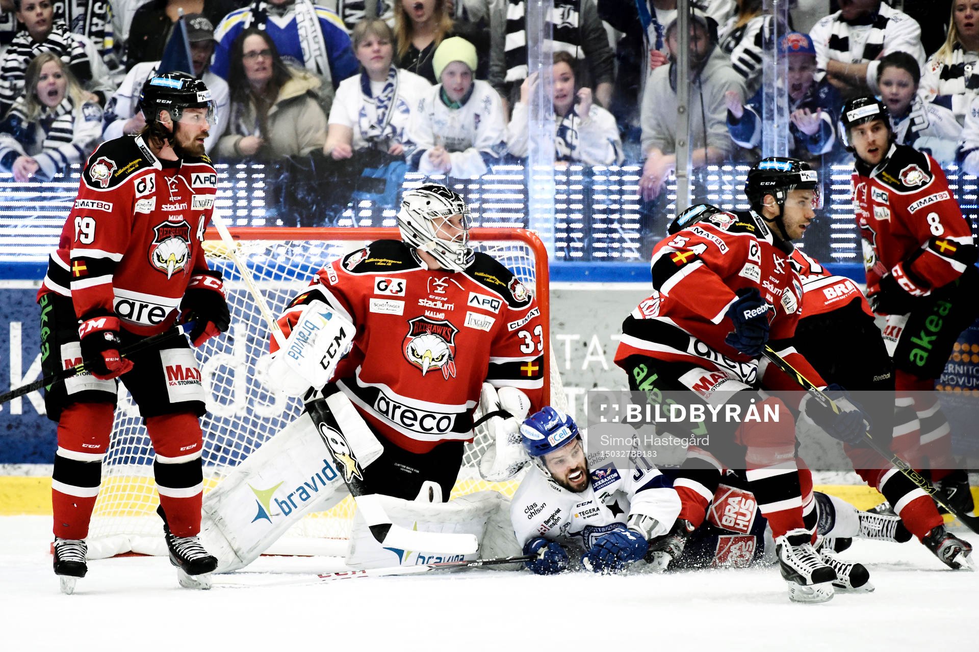 Malmö Redhawks Stefan Warg  och målvakt Niko Hovinen  och