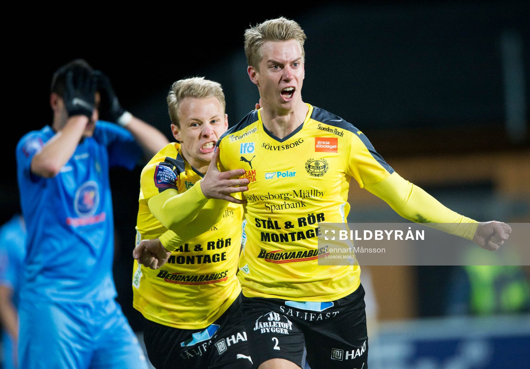 Mjällbys Hampus Bergdahl har kvitterat till 1-1 och grattas av Joel Wedenell i matchen i Superettan mellan Mjällby och Athletic i Mjällby 8 april 2015.