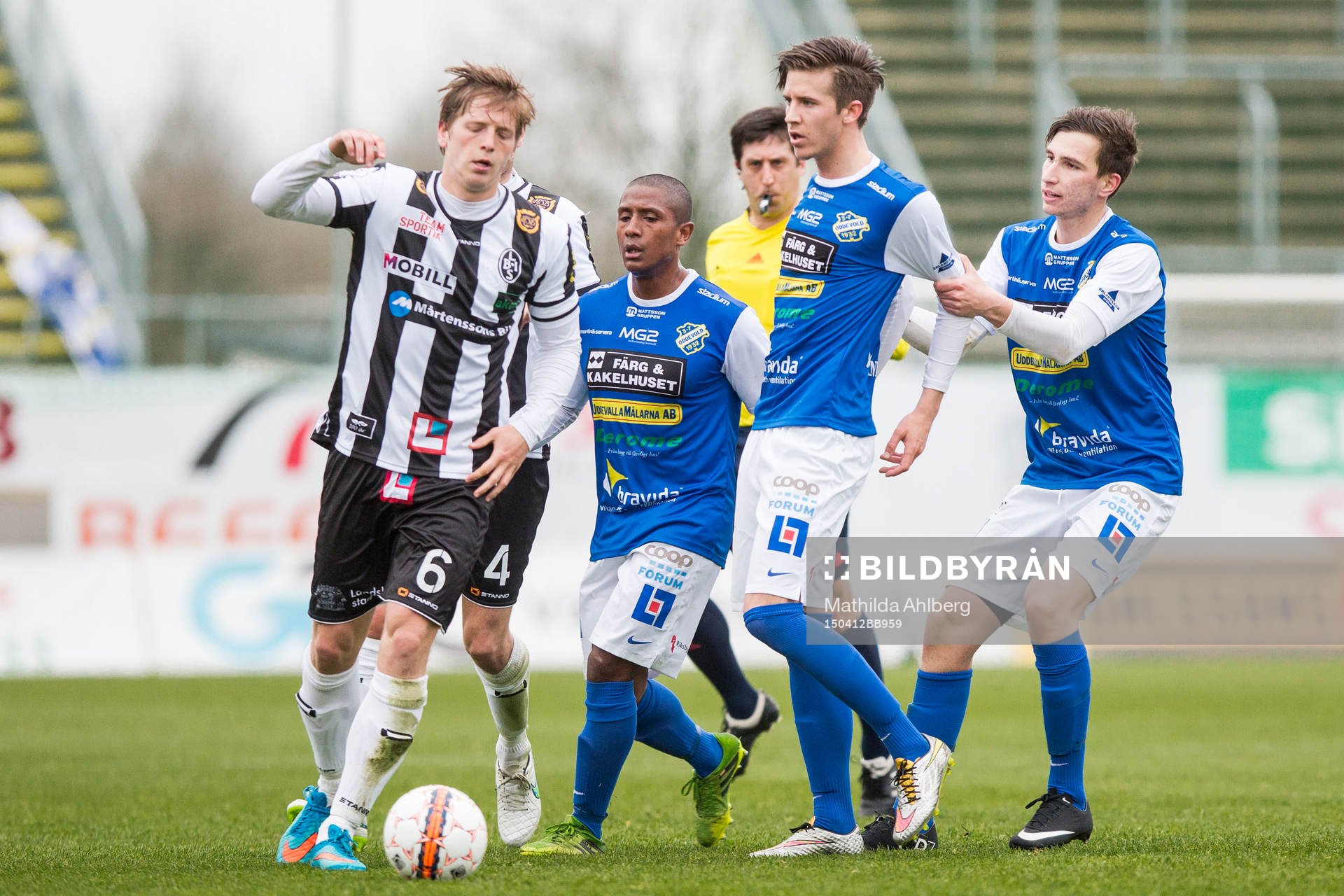 Landskronas Philip Andersson lämnar diskussion med Oddevolds Daniel Janevski som stoppas av Oddevolds Alen Kasumovic efter en tidigare duell under fotbollsmatchen i division 1 mellan Landskrona och Oddevold den 12 April 2015 i Landskrona.