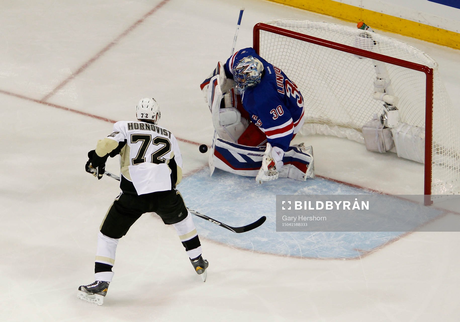 New York Rangers goalie Henrik Lundqvist makes a save