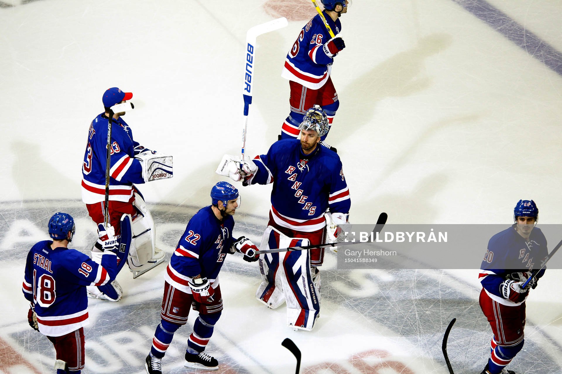 New York Rangers goalie Henrik Lundqvist (C) acknowledges