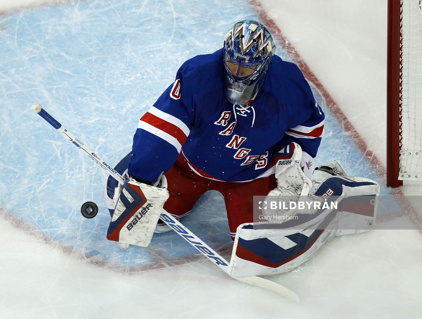 New York Rangers goalie Henrik Lundqvist makes a save