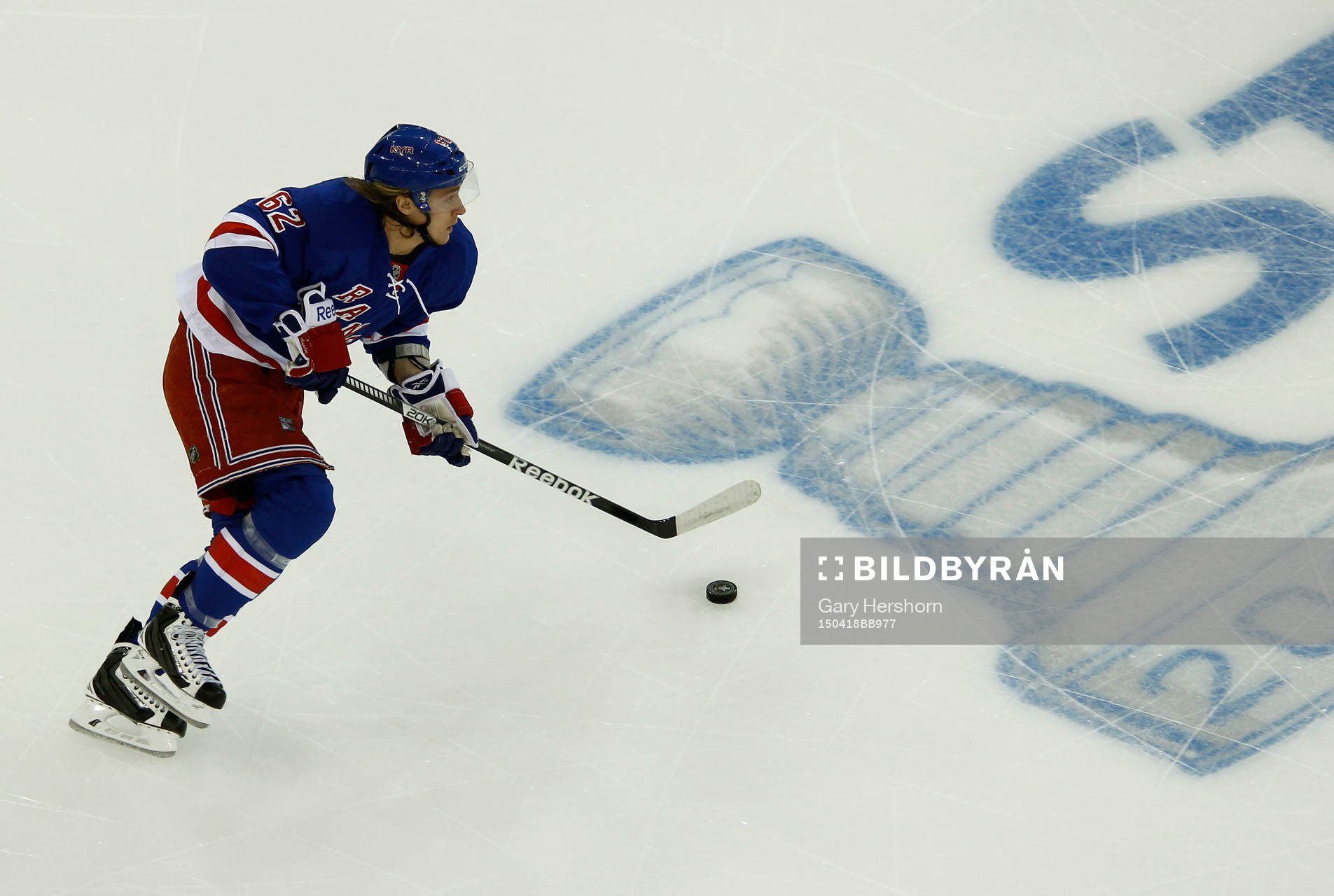 New York Rangers Carl Hagelin skates with the puck against