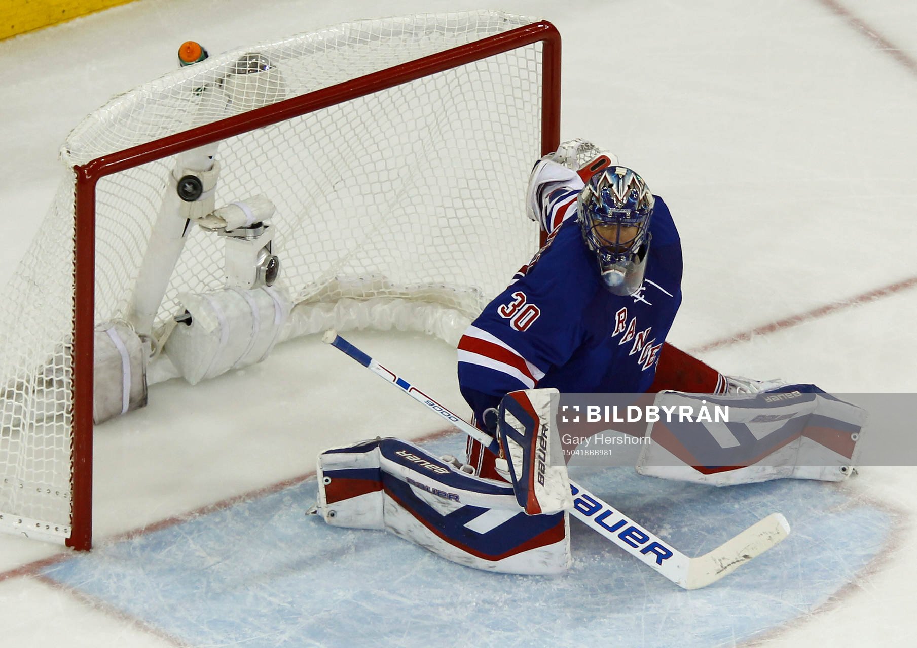 New York Rangers goalie Henrik Lundqvist makes a save