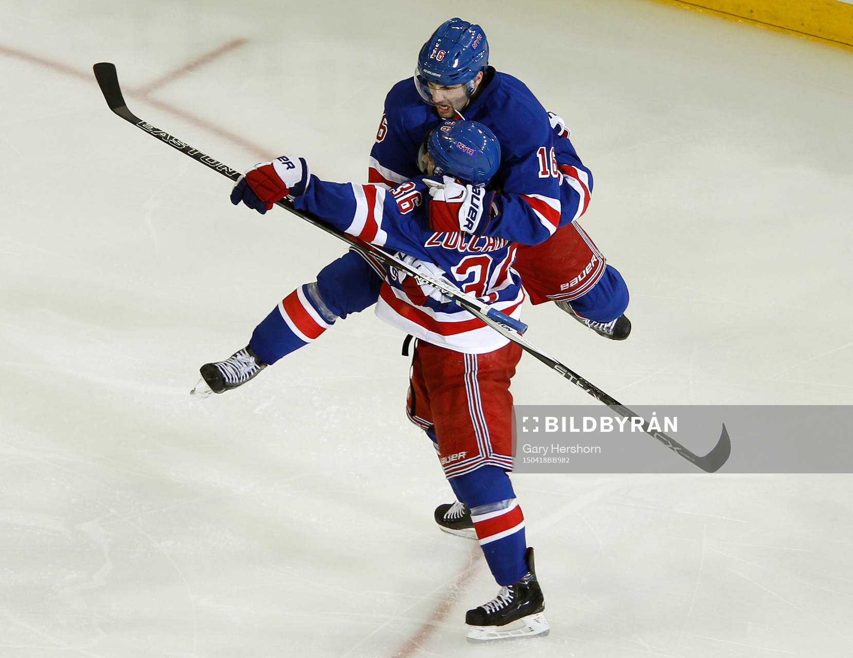 New York Rangers Derick Brassard (top) celebrates with