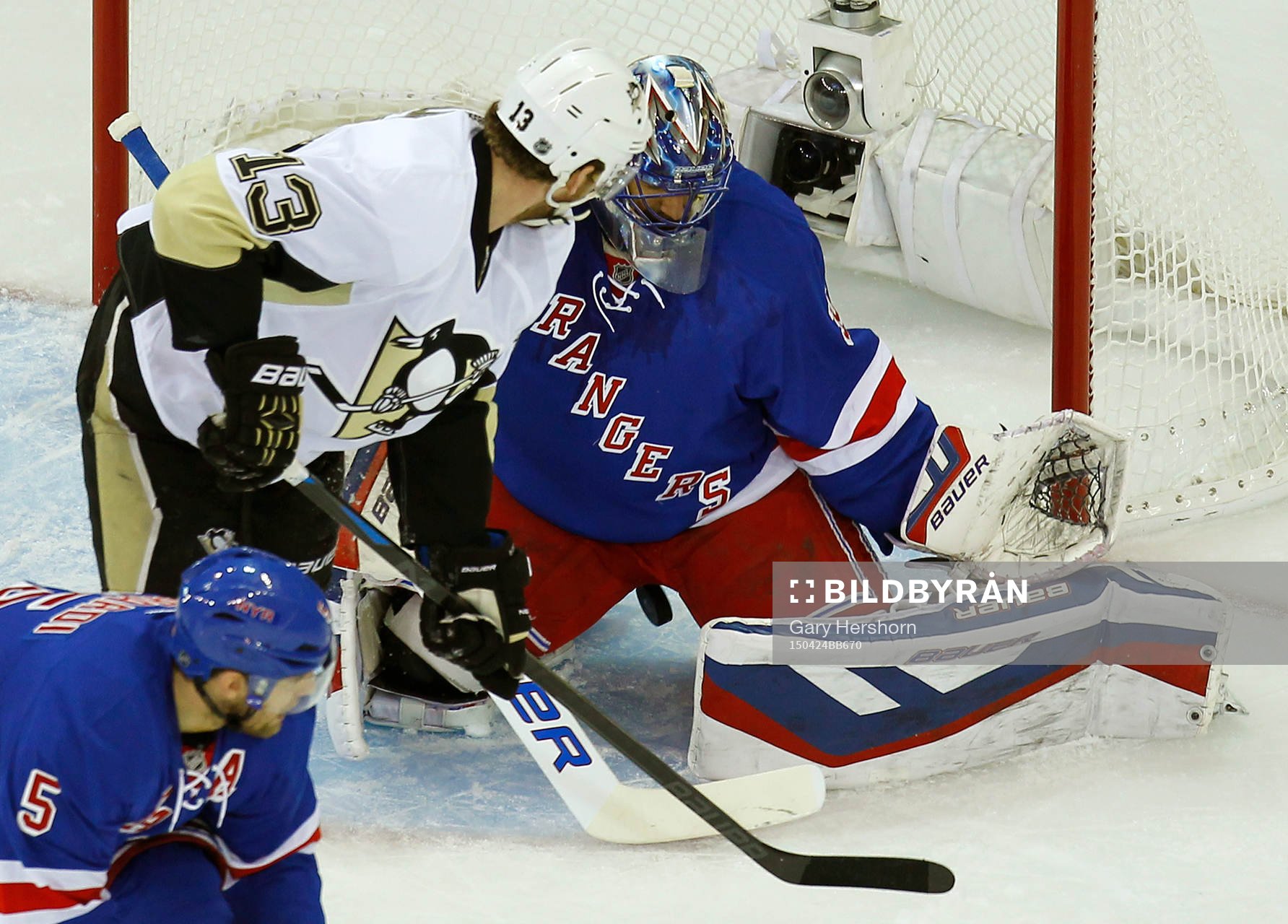 New York Rangers goalie Henrik Lundqvist makes a save