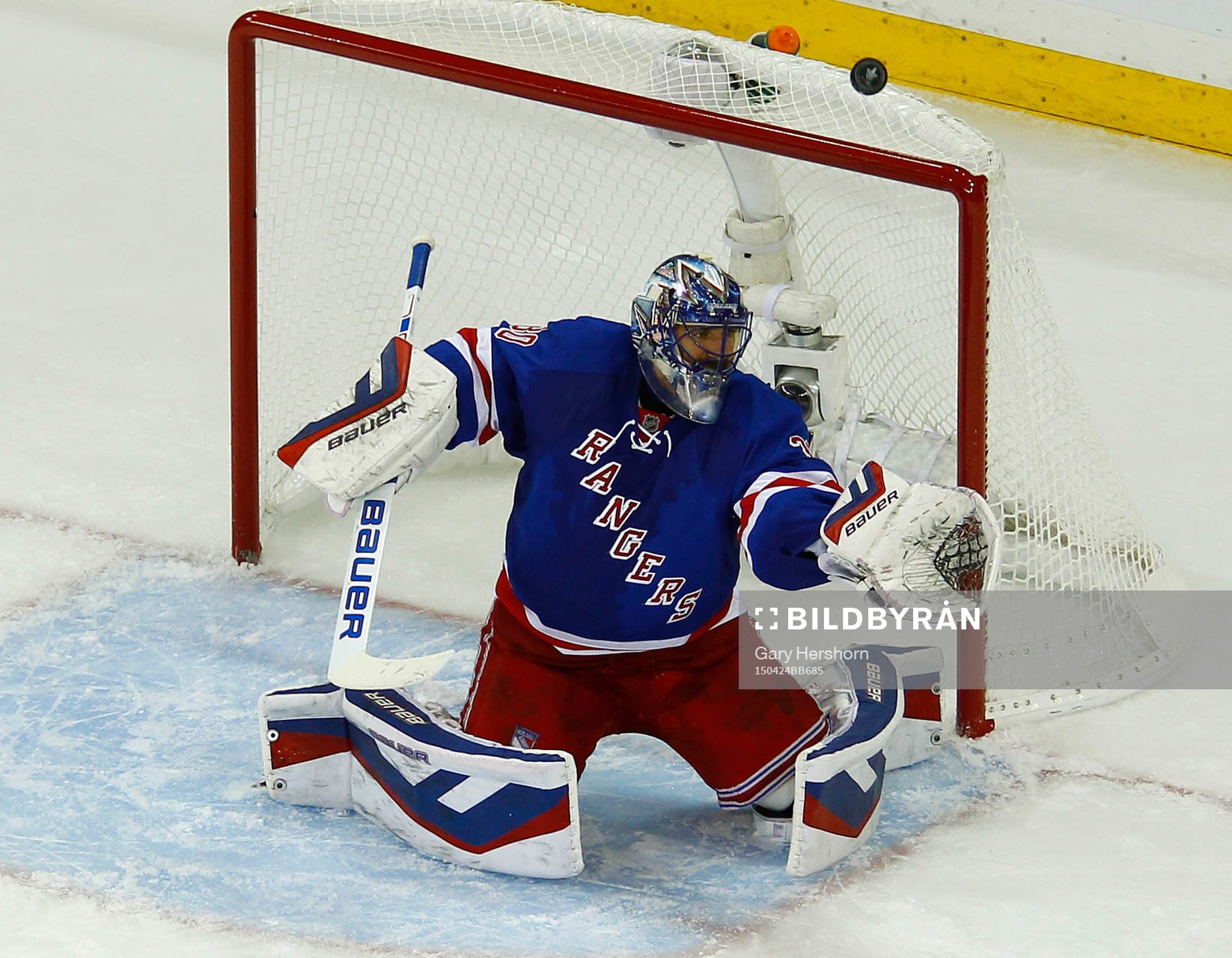 New York Rangers goalie Henrik Lundqvist makes a save