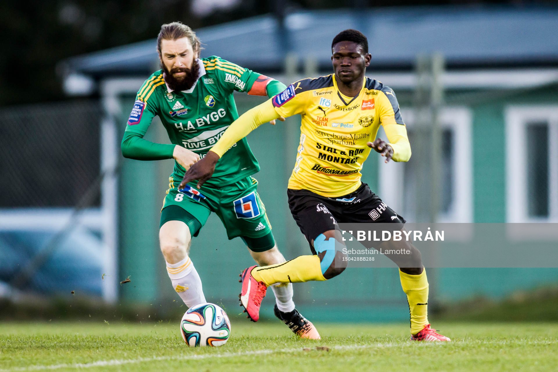 Ljungskiles Marcus Gustafsson och Mjällbys Kwame Bonsu under fotbollsmatchen i Superettan mellan Ljungskile och Mjällby den 28 april 2015 i Ljungskile.