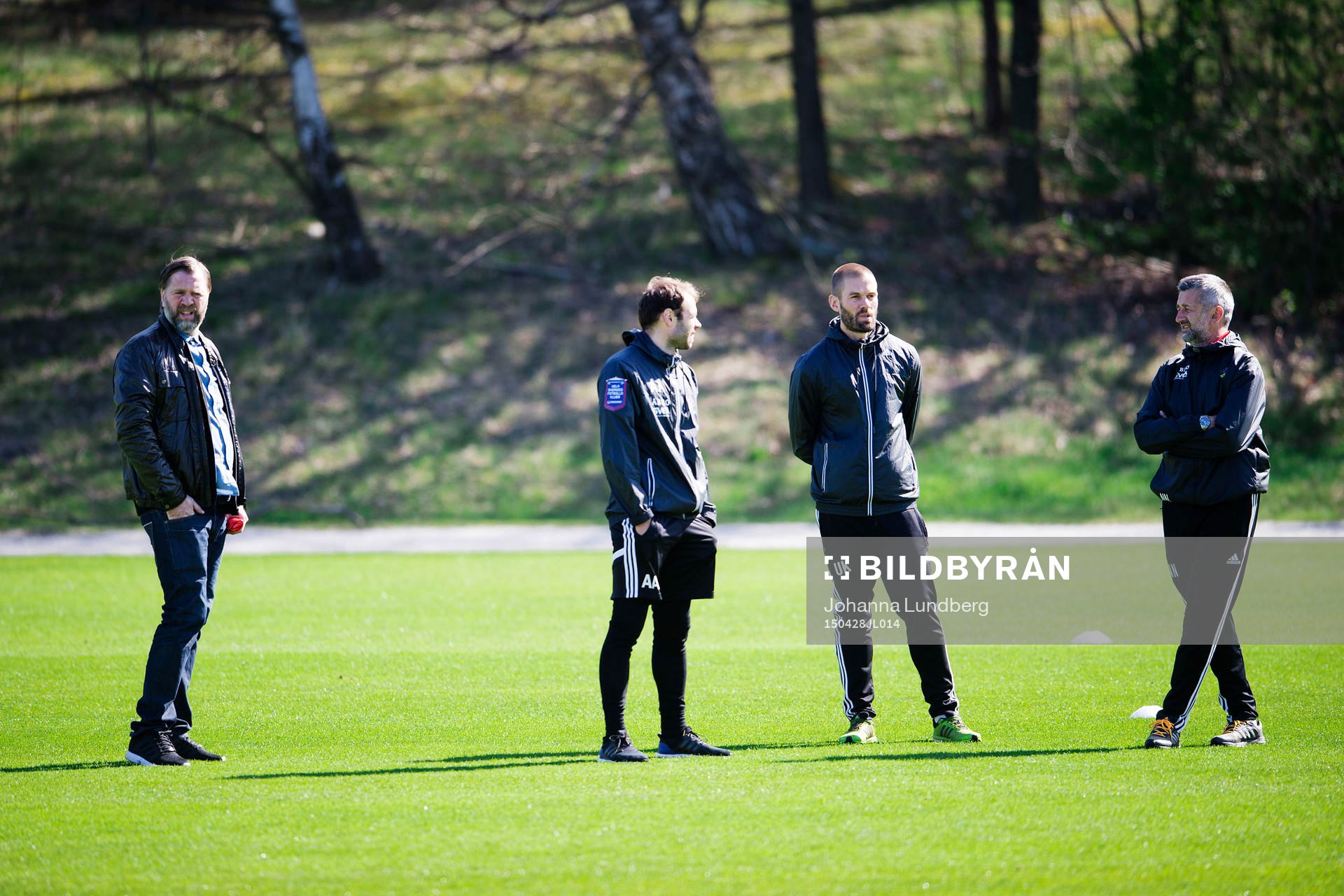 AIK:s sportchef Björn Wesström tränare Andreas Alm, assisterande tränare Ulf Kristiansson och assisterande tränare Nebojsa Novakovic under en fotbollsträning med AIK den 28 april 2015 i Stockholm.