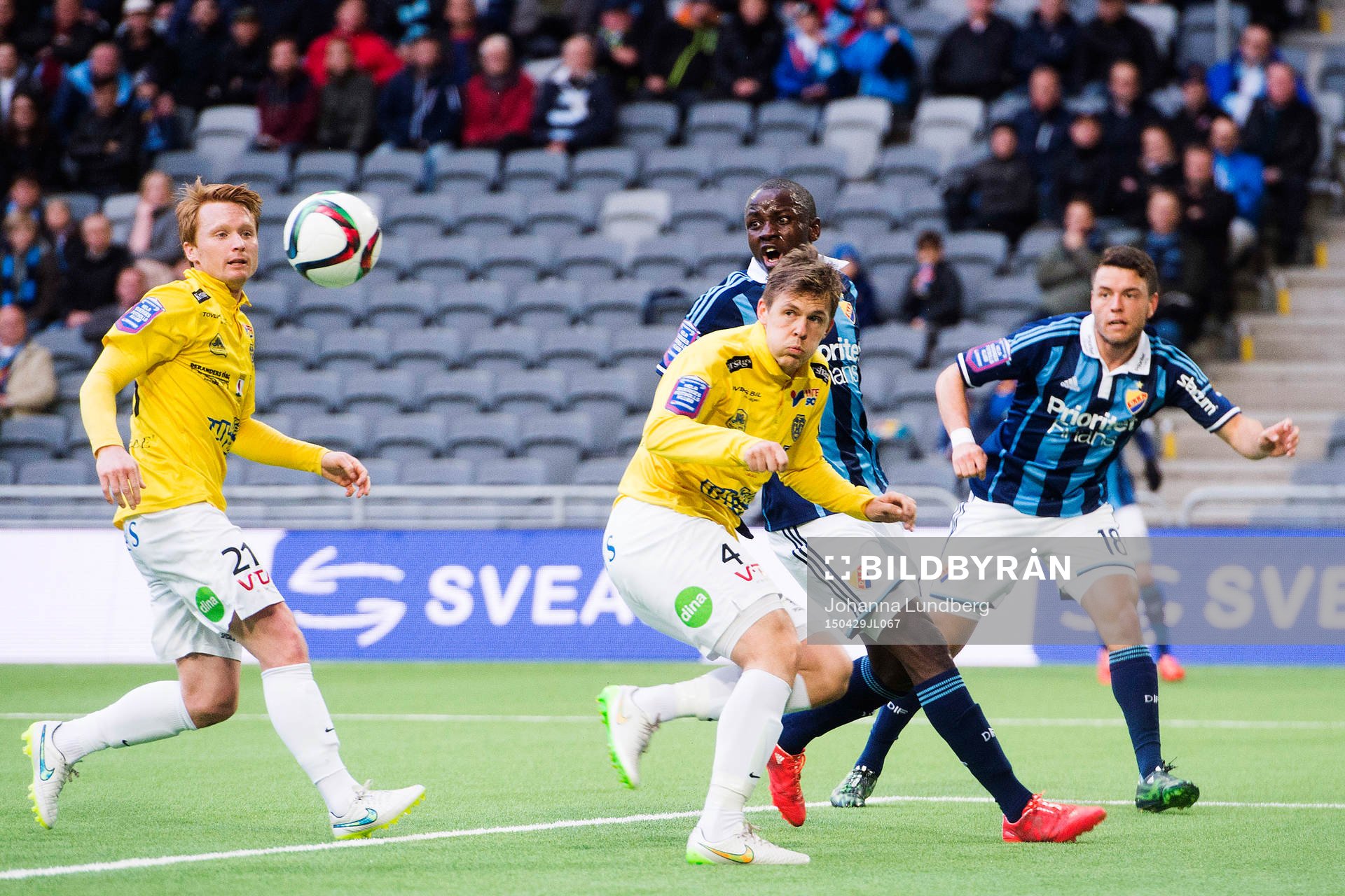 Falkenbergs Dan Keat och Daniel Johansson i en duell mot Djurgårdens Omar Colley och Kerim Mrabti under fotbollsmatchen i Allsvenskan mellan Djurgården och Falkenberg den 29 april 2015 i Stockholm.