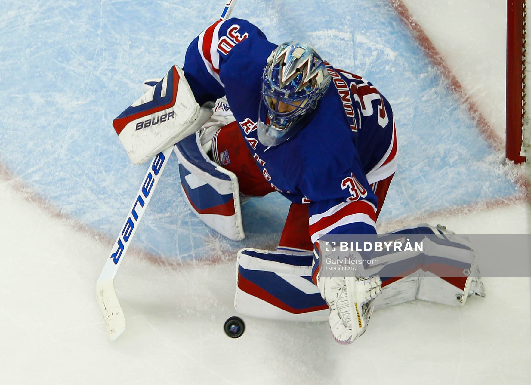 New York Rangers goalie Henrik Lundqvist makes a save