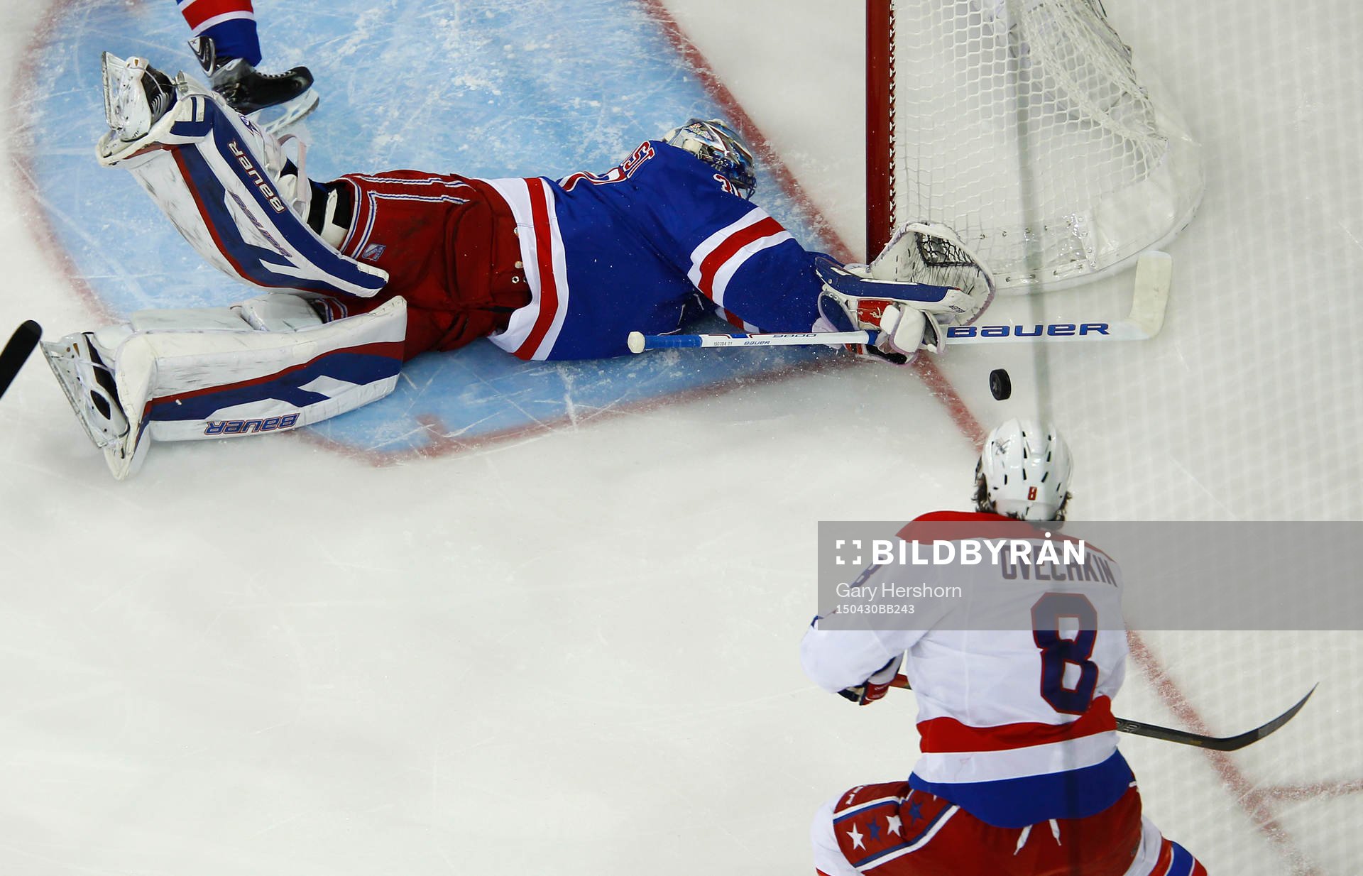 New York Rangers goalie Henrik Lundqvist makes a save